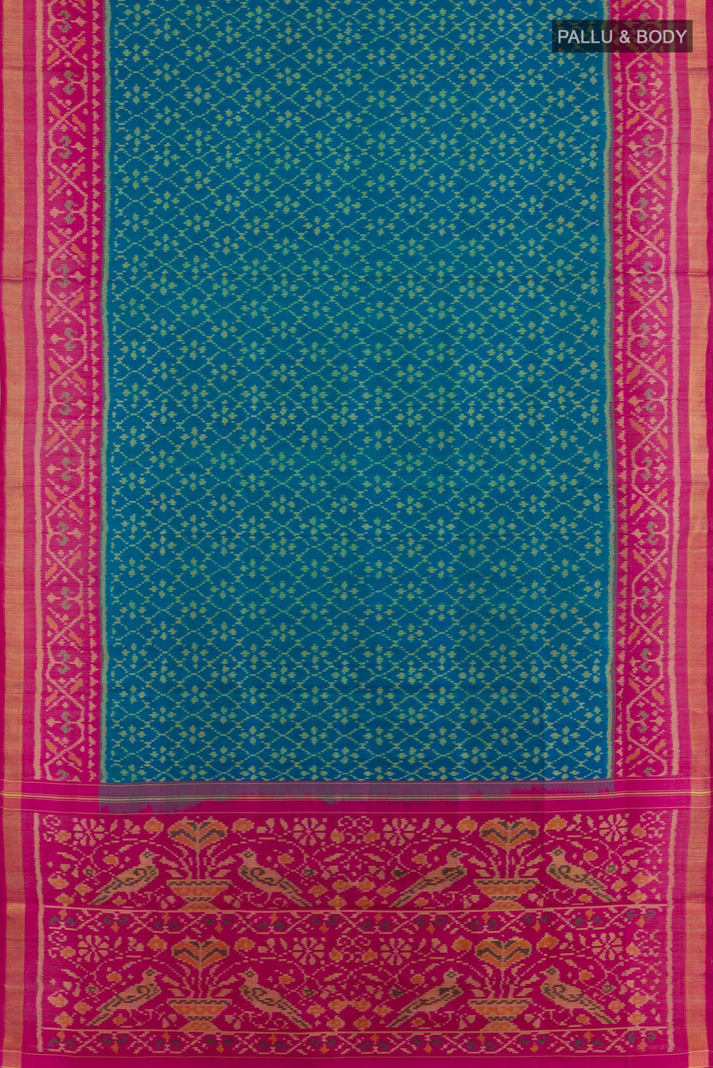 Flat view of Blue Rajkot Patola Silk Saree with Ikat design on the body and Zari Border. 