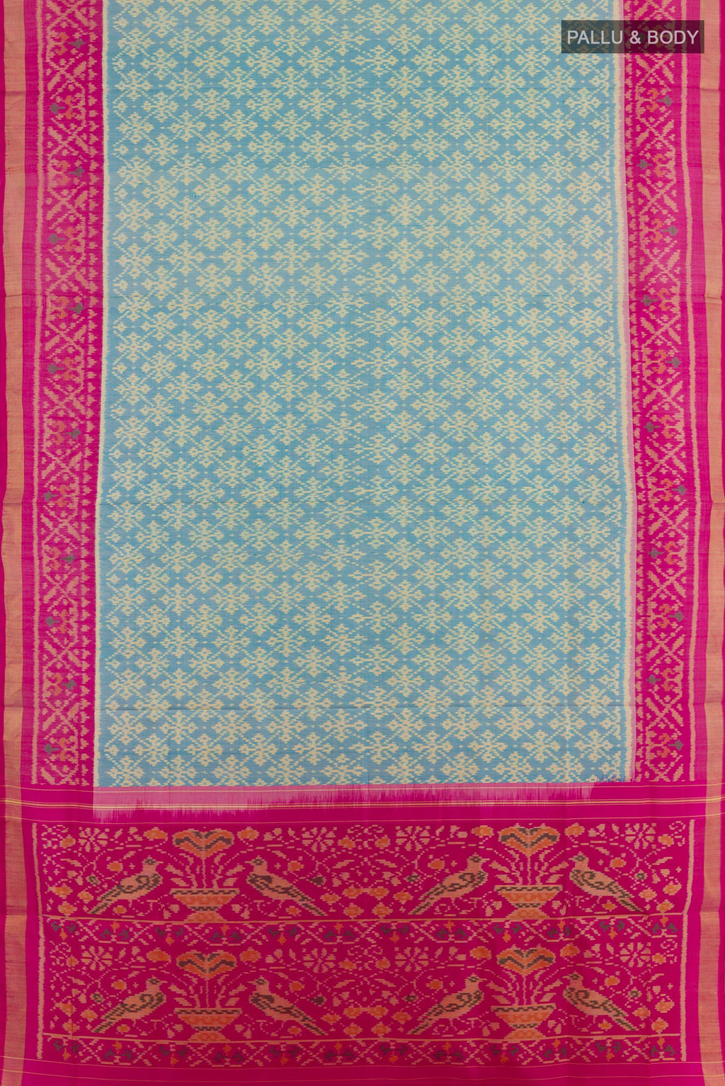 Flat view of Blue Rajkot Patola Silk Saree with Ikat design on the body and Zari Border. 