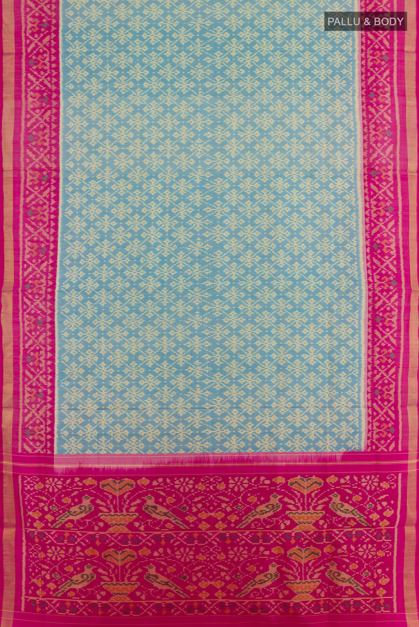 Flat view of Blue Rajkot Patola Silk Saree with Ikat design on the body and Zari Border. 