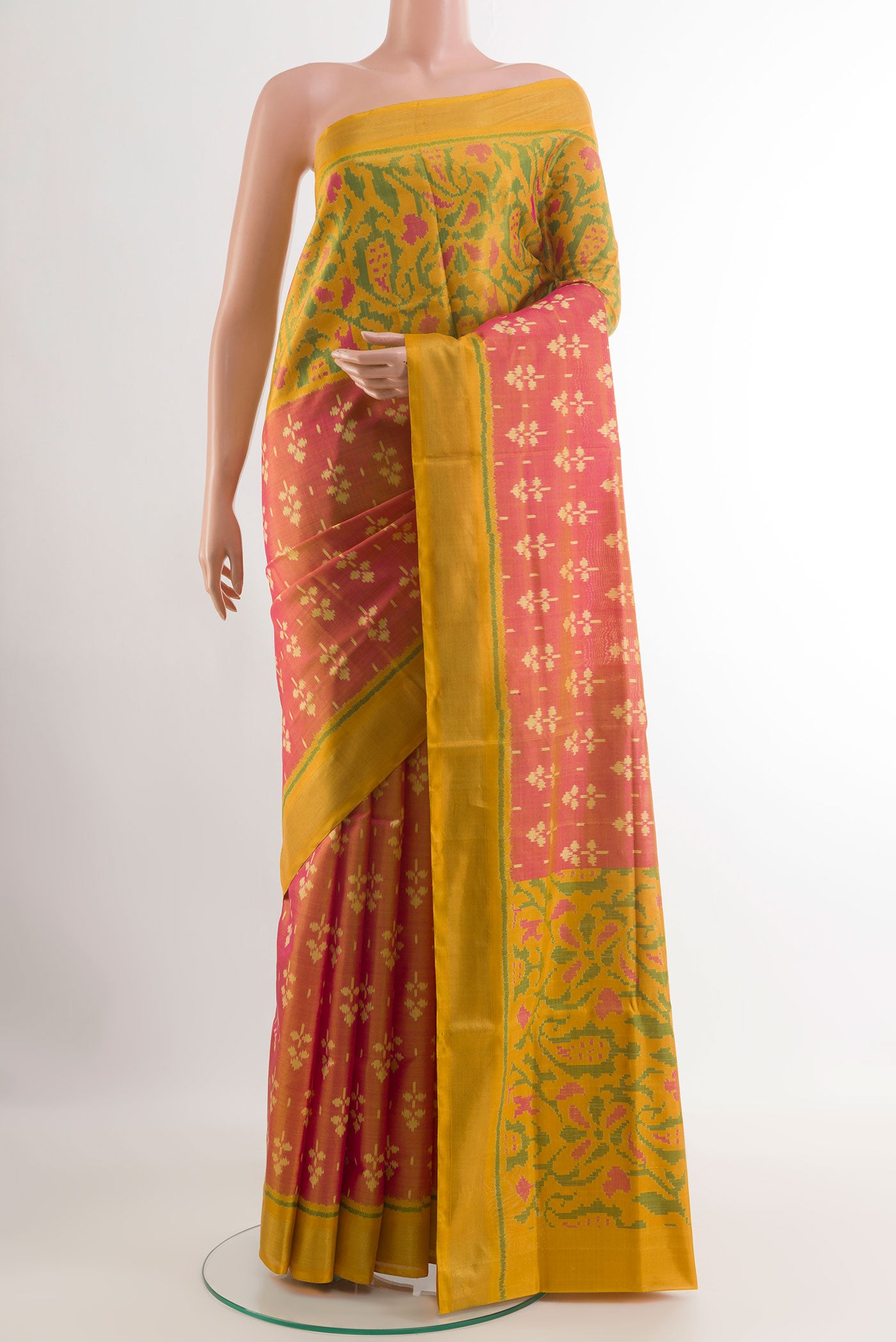 Pink Pochampally Silk Saree with Pure Ikat on the body and Zari Border.  displayed on a mannequin