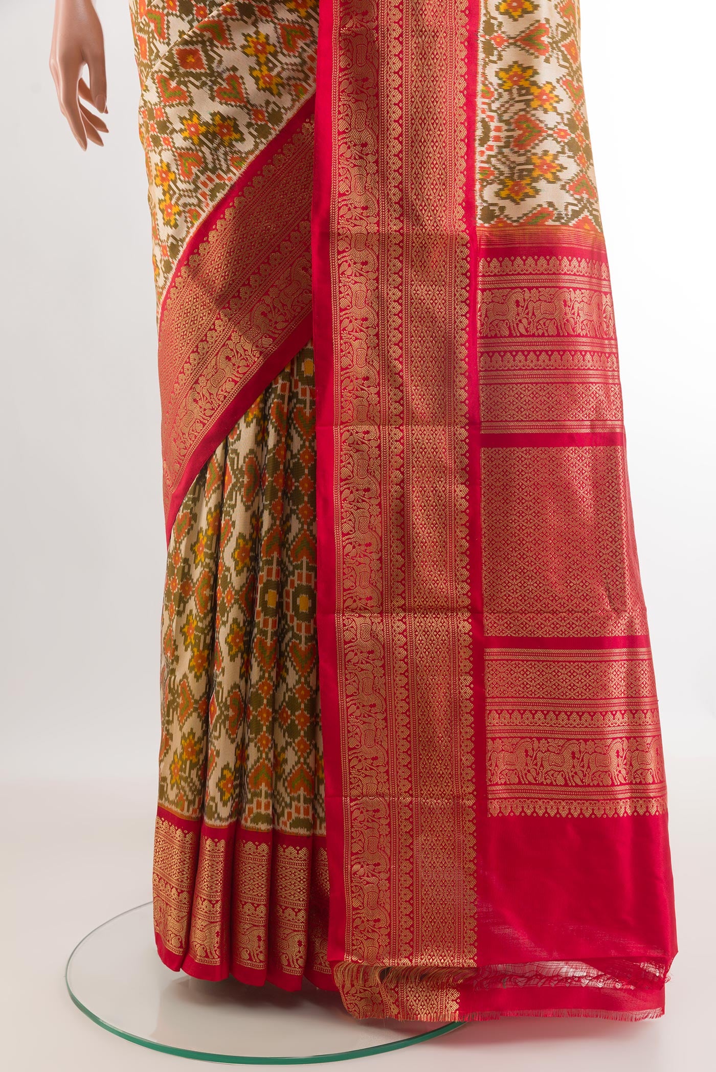 Pleats and pallu of Off White Pochampally Silk Saree with Ikat design on the body and Zari Border. 