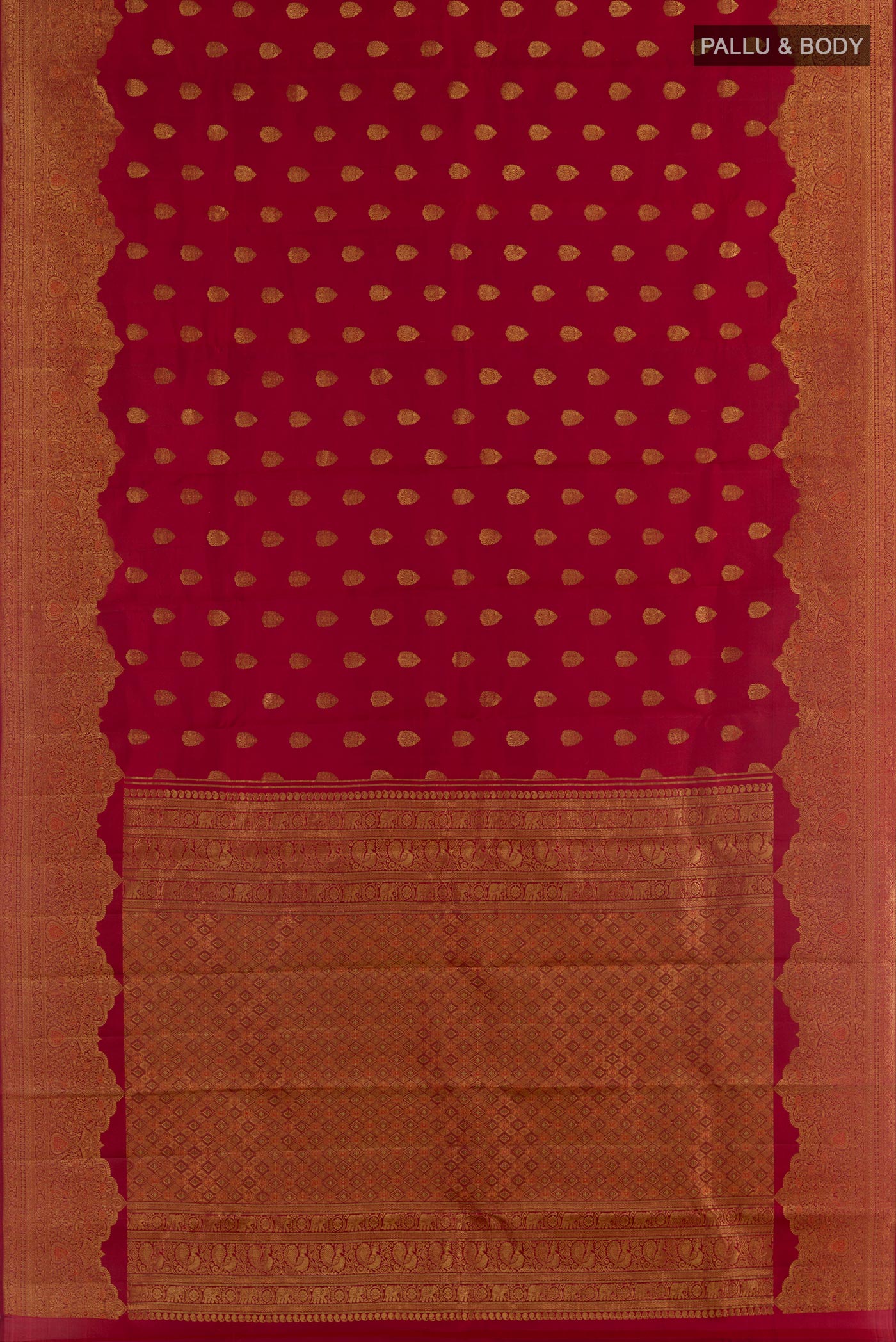 Flat view of Maroon Kanchipuram Silk Saree with Zari Butta on the body and Zari Border. 