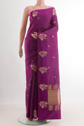 Purple Banarasi Katan Silk Saree with Zari Butta on the body and Zari Border.  displayed on a mannequin