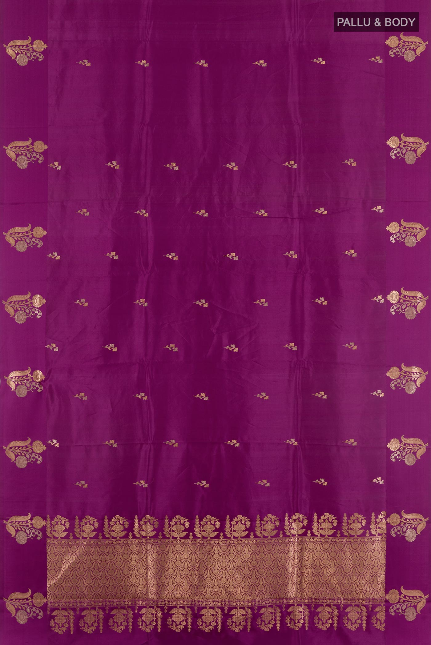 Flat view of Purple Banarasi Katan Silk Saree with Zari Butta on the body and Zari Border. 