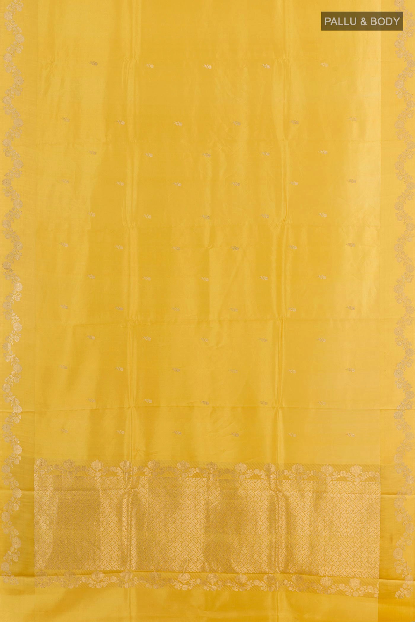 Flat view of Yellow Banarasi Katan Silk Saree with Zari Butta on the body and Zari Border. 
