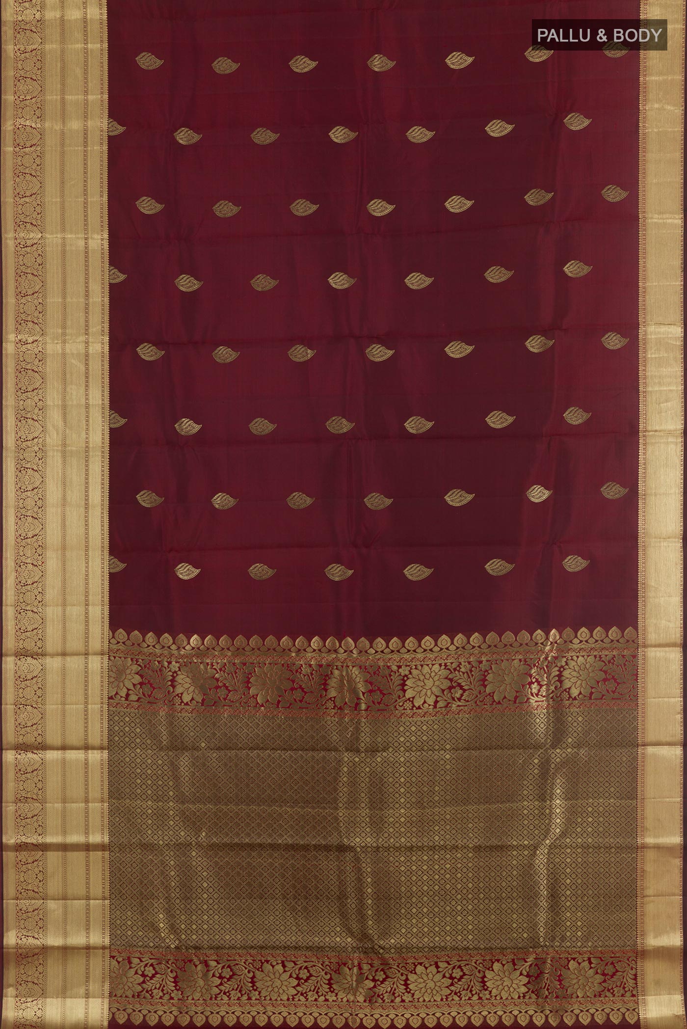 Flat view of Maroon Kanjivaram Silk Saree with Zari Butta on the body and Zari Border. 