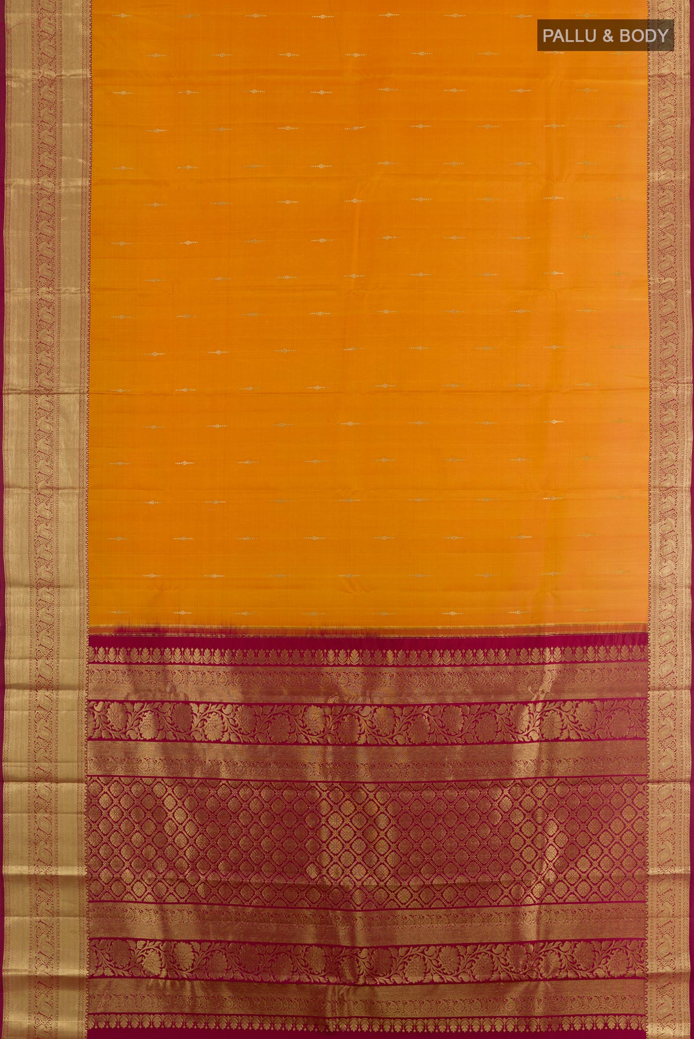 Flat view of Mustard Kanchipuram Silk Saree with Zari Butta on the body and Zari Border. 