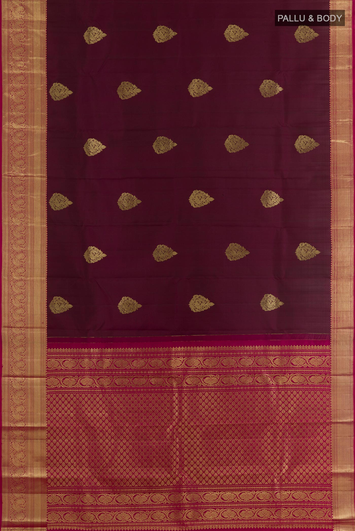 Flat view of Maroon Kanchipuram Silk Saree with Zari Butta on the body and Zari Border. 