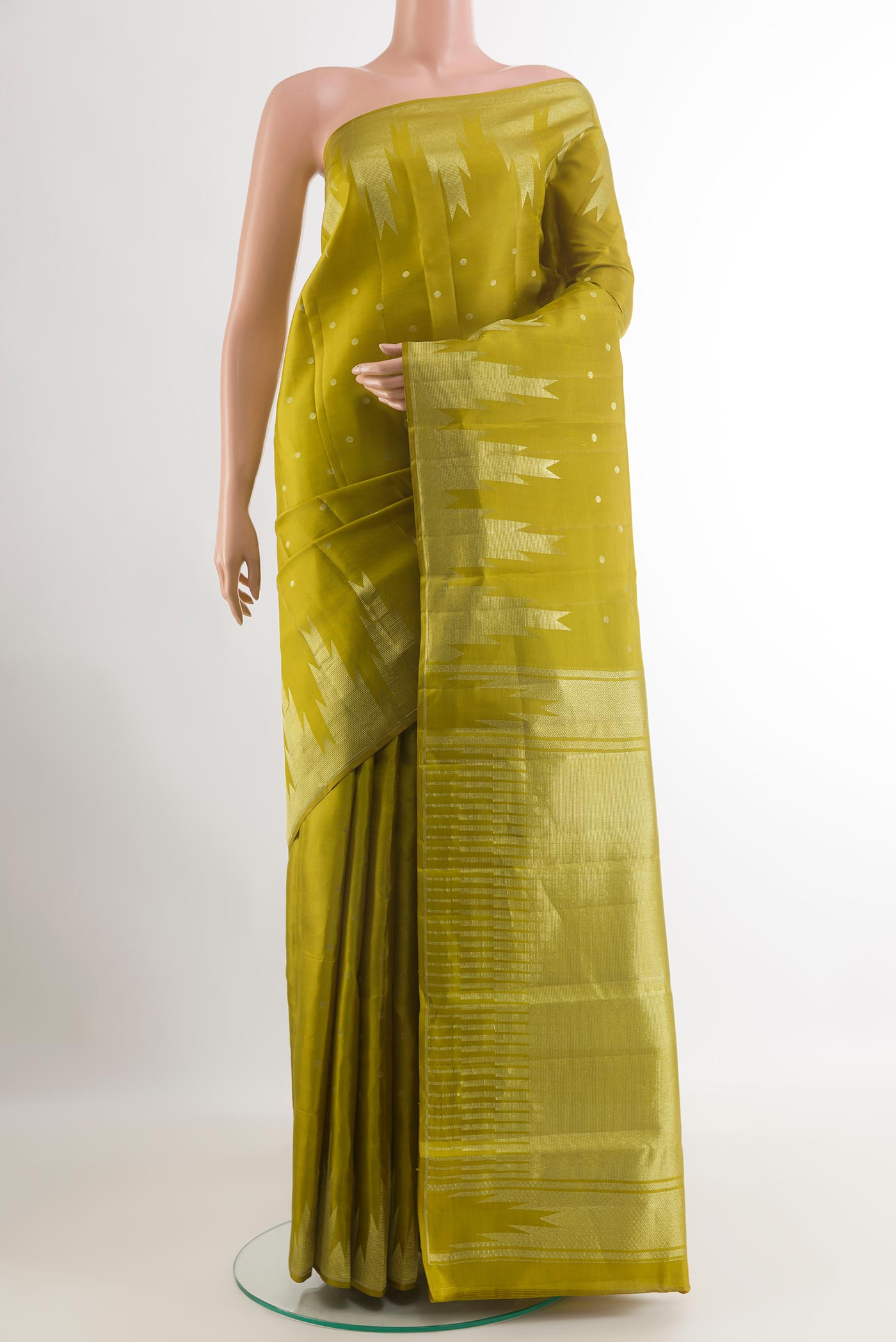 Mehandi Green Kanchipuram Silk Saree with Zari Butta on the body and Zari Border.  displayed on a mannequin