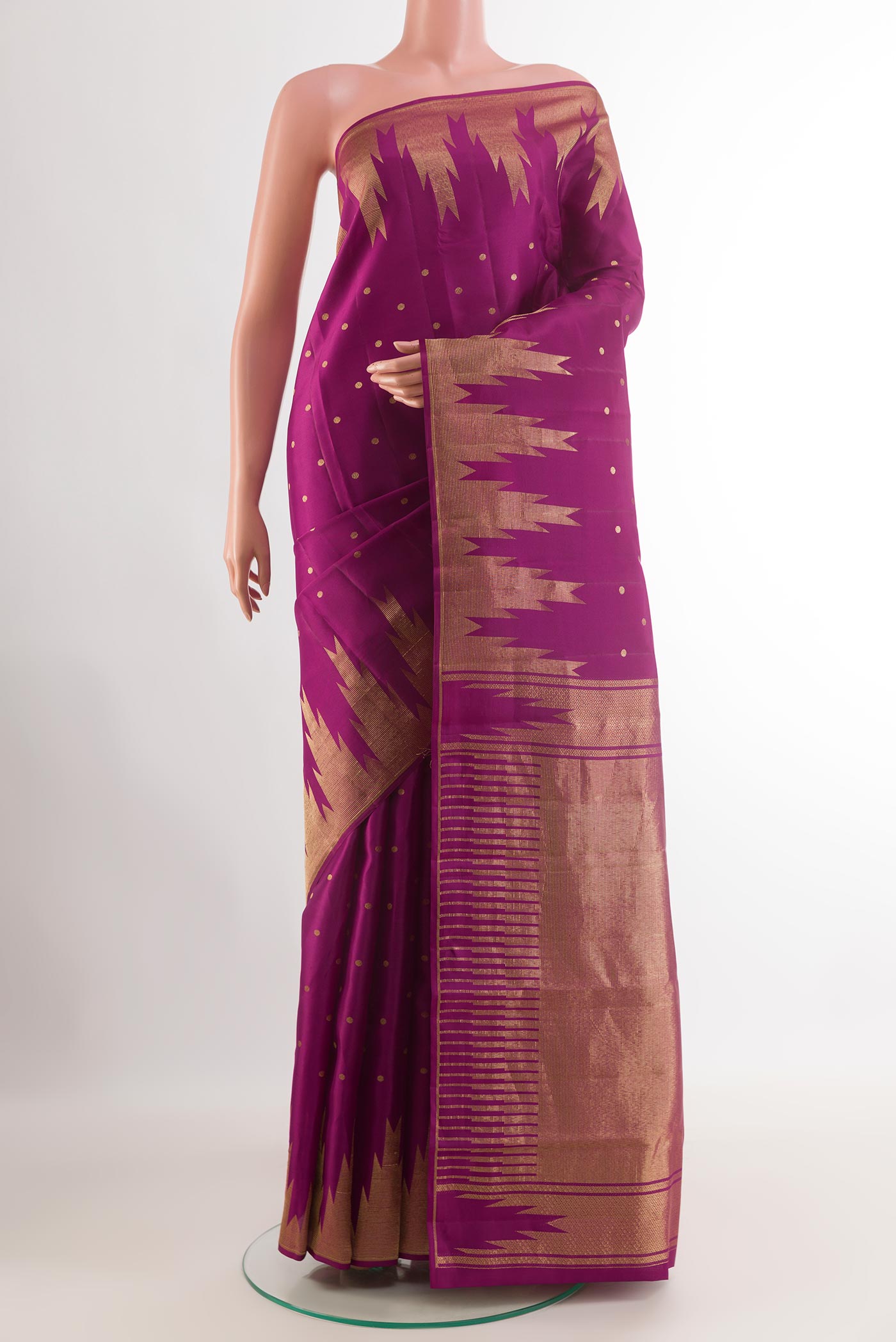 Purple Kanchipuram Silk Saree with Jacquard design on the body and Zari Border.  displayed on a mannequin