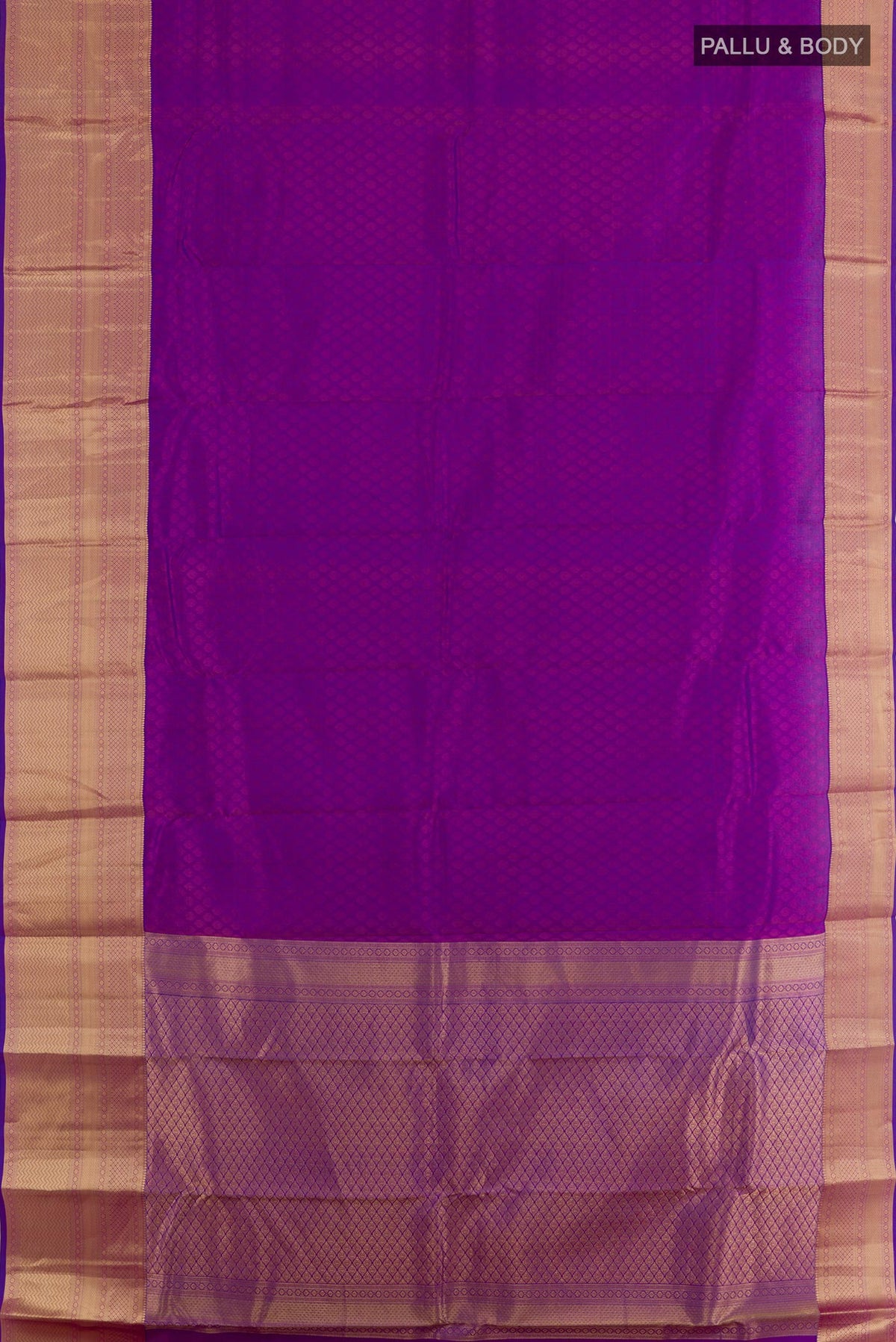 Flat view of Purple Kanchipuram Silk Saree with Jacquard design on the body and Zari Border. 