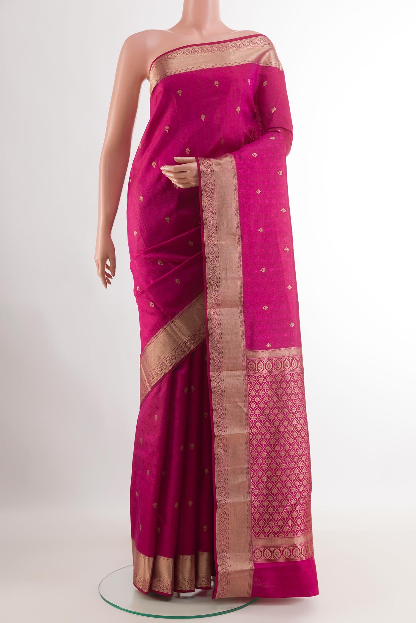 Rani Pink Kanchipuram Silk Saree with Jacquard With Zari Butta on the body and Zari Border.  displayed on a mannequin
