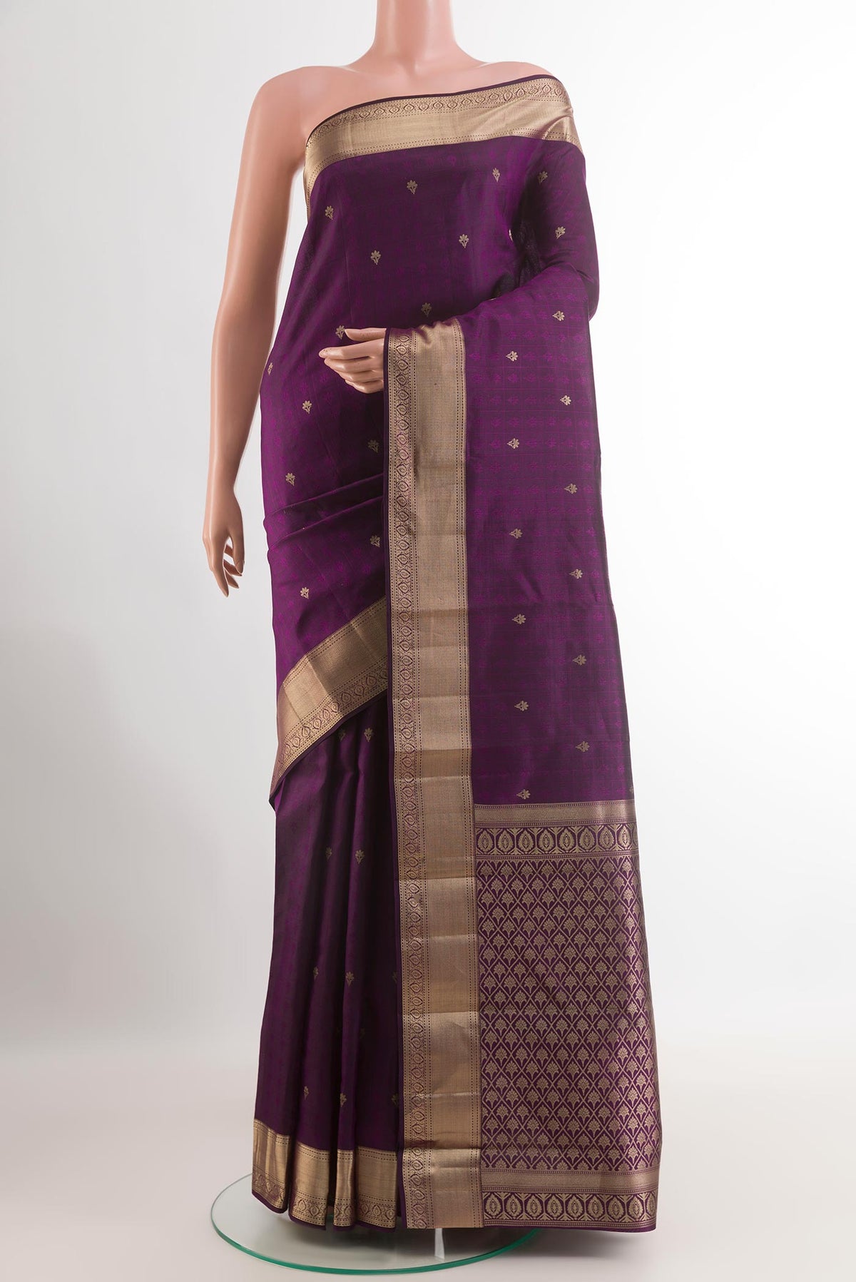 Purple Kanchipuram Silk Saree with Zari Butta on the body and Zari Border.  displayed on a mannequin