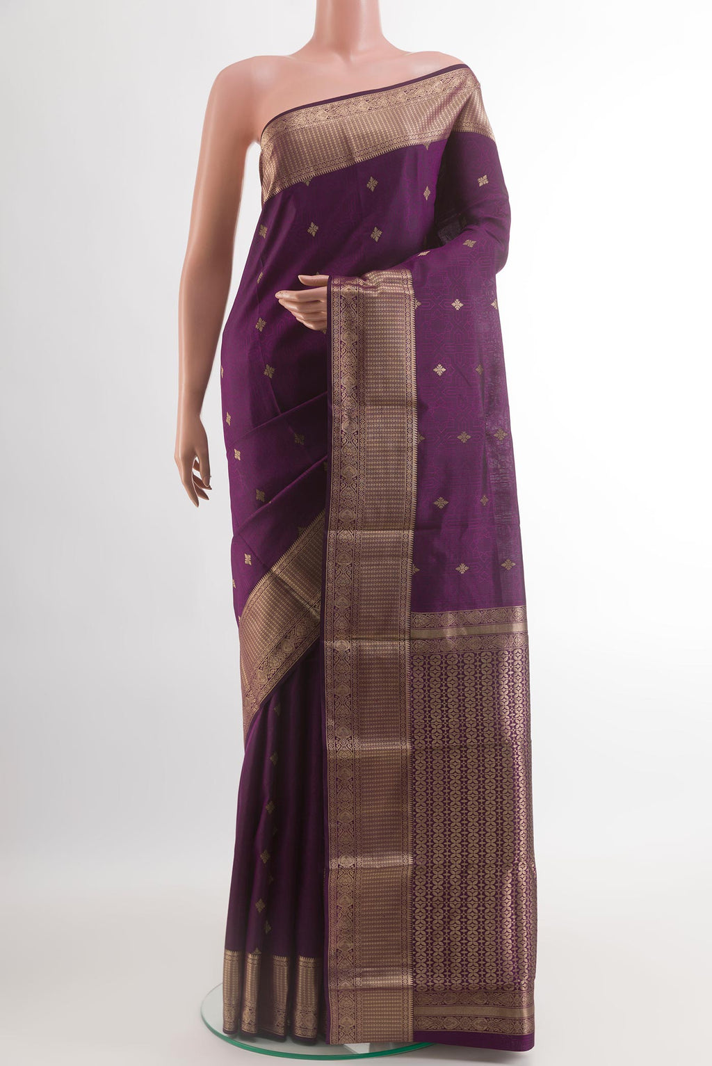 Purple Kanchipuram Silk Saree with Jacquard With Zari Butta on the body and Zari Border.  displayed on a mannequin