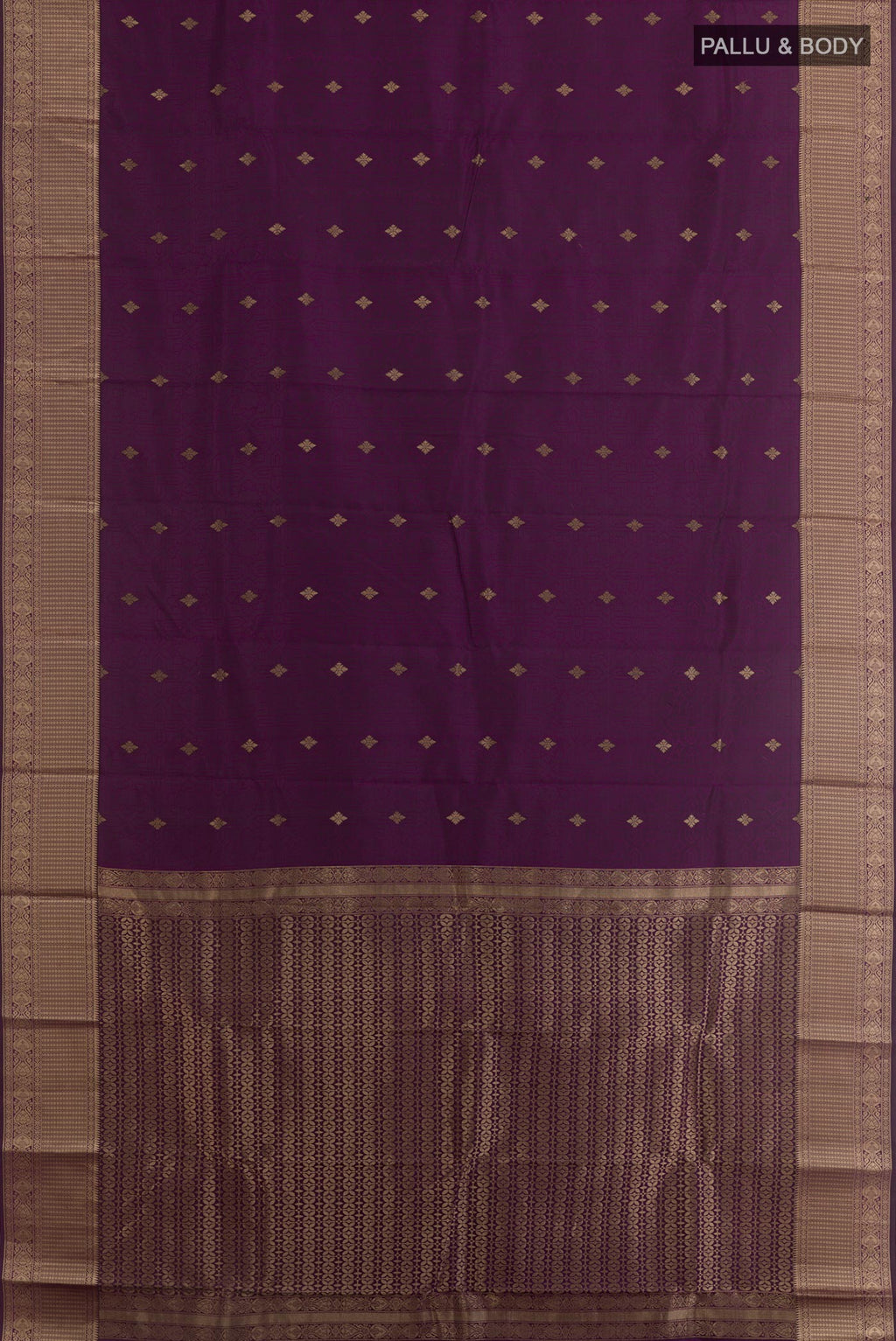 Flat view of Purple Kanchipuram Silk Saree with Jacquard With Zari Butta on the body and Zari Border. 