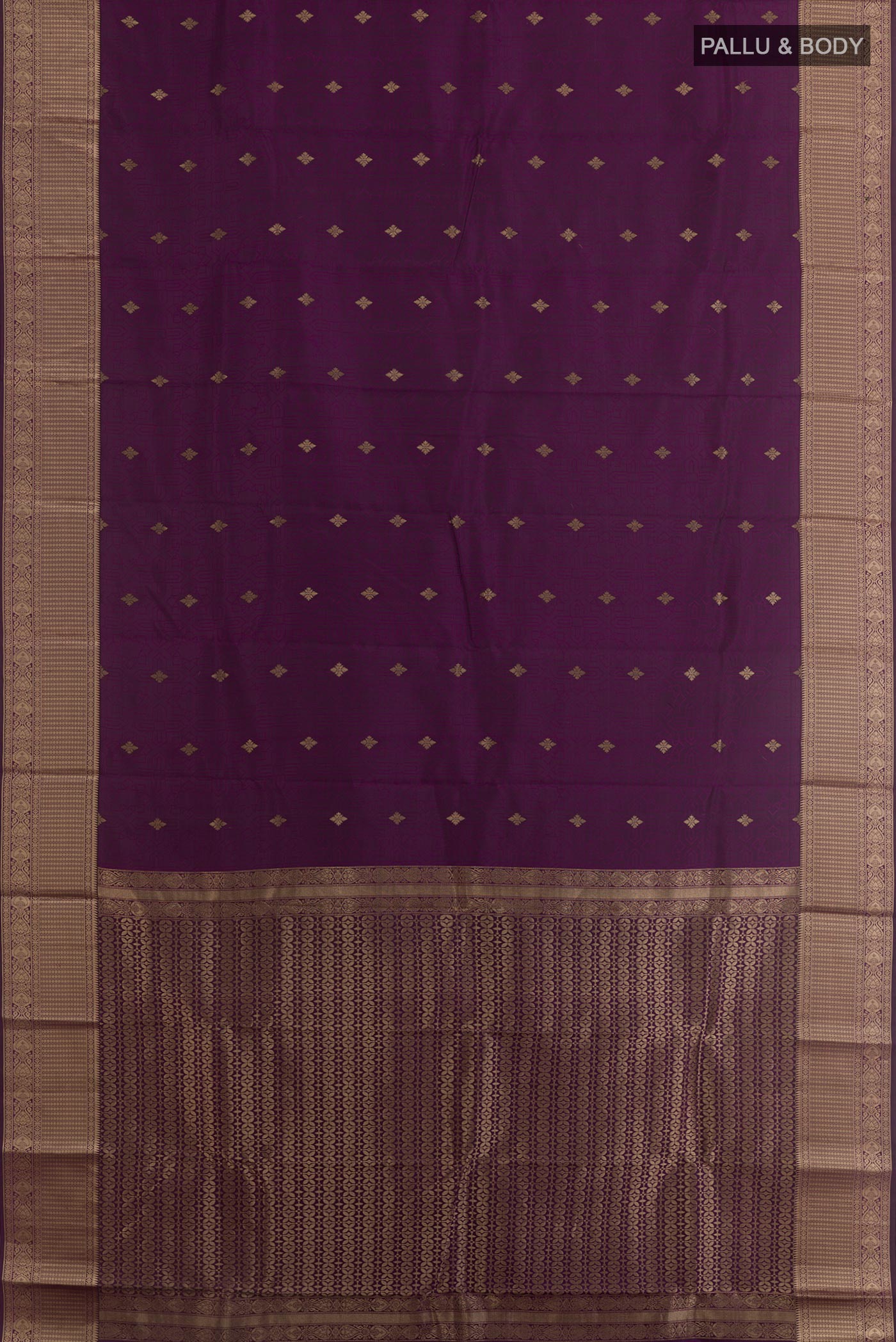 Flat view of Purple Kanchipuram Silk Saree with Jacquard With Zari Butta on the body and Zari Border. 