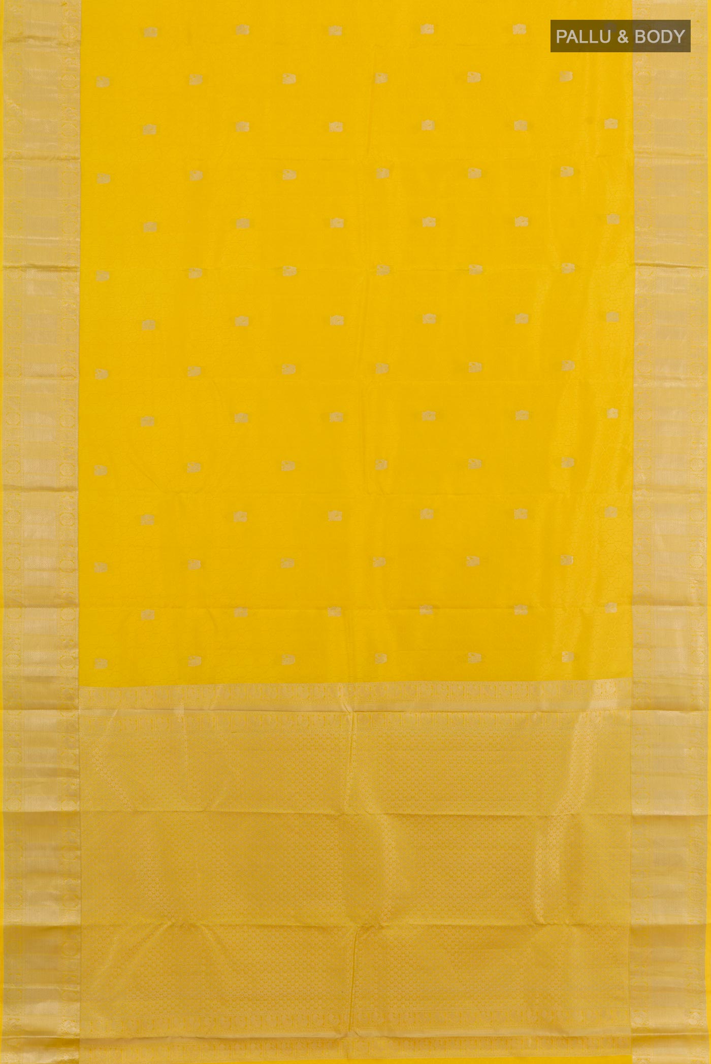 Flat view of Yellow Kanchipuram Silk Saree with Jacquard With Zari Butta on the body and Zari Border. 
