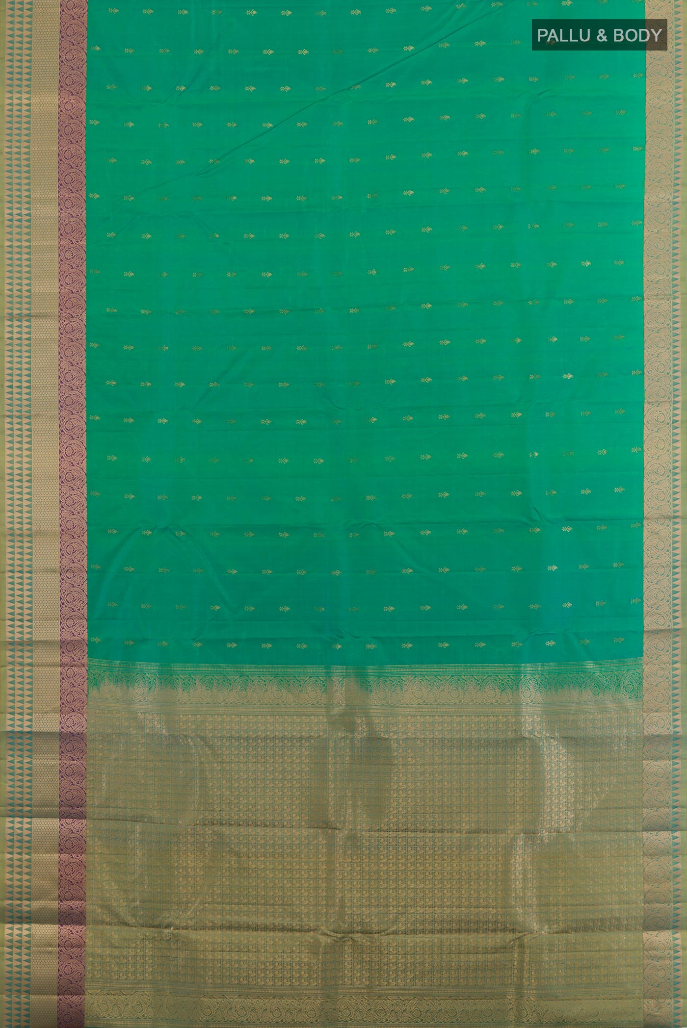 Flat view of Green Kanjivaram Silk Saree with Zari Butta on the body and Zari Border. 