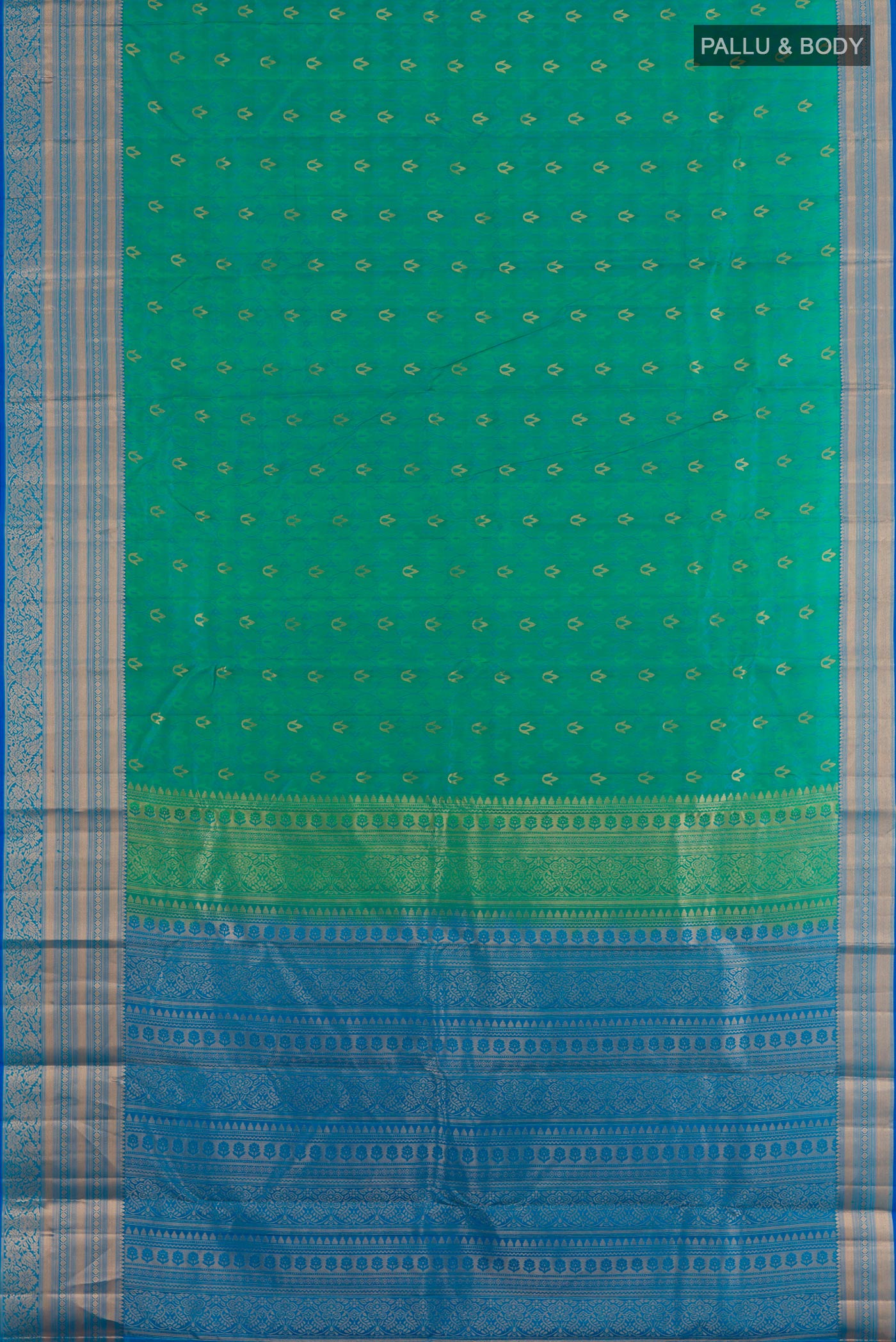Flat view of Sea Green Kanjivaram Silk Saree with Jacquard With Zari Butta on the body and Zari Border. 