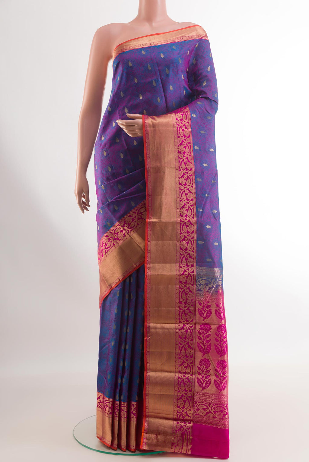 Purple Kanjivaram Silk Saree with Jacquard With Zari Butta on the body and Zari Border.  displayed on a mannequin