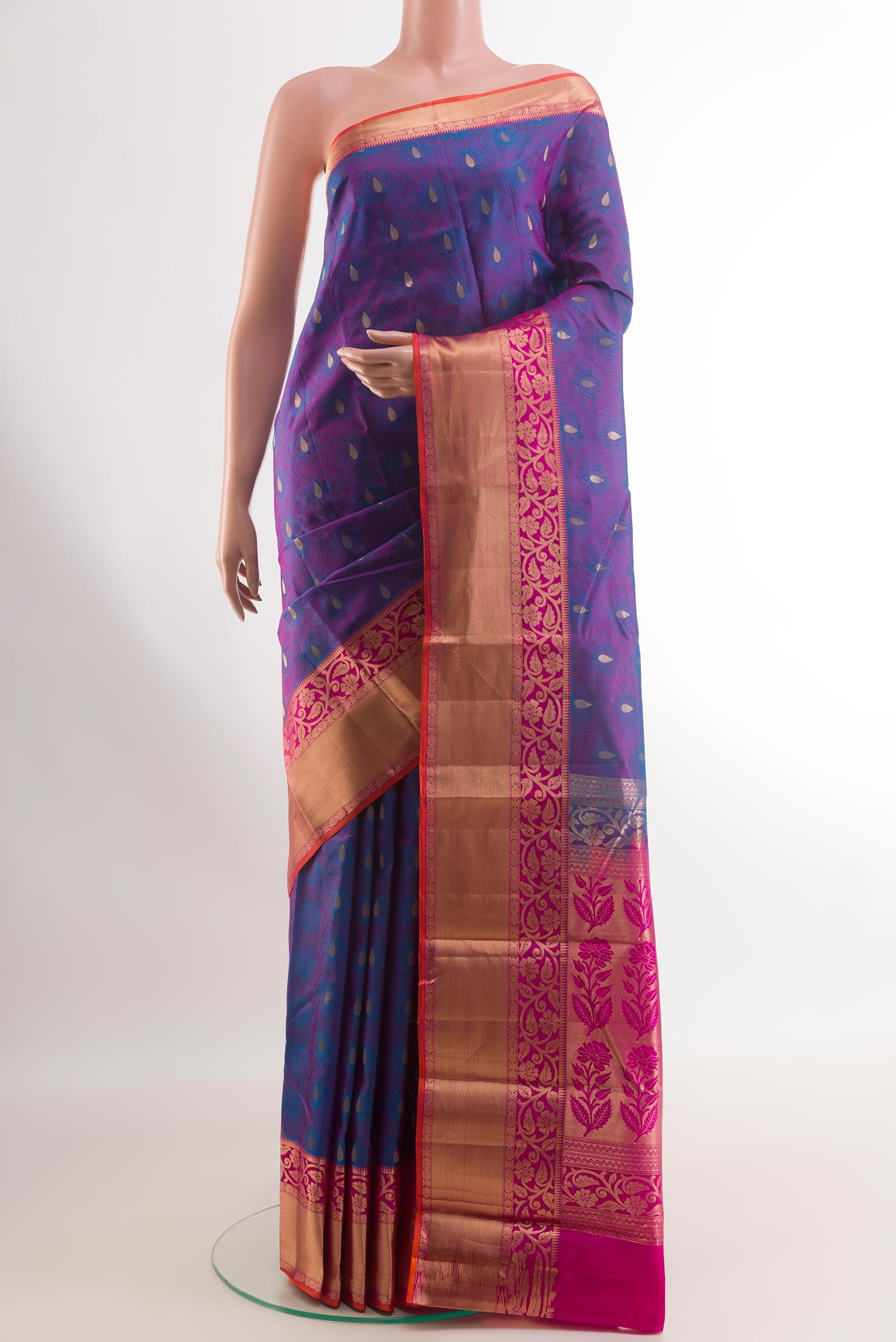Purple Kanjivaram Silk Saree with Jacquard With Zari Butta on the body and Zari Border.  displayed on a mannequin