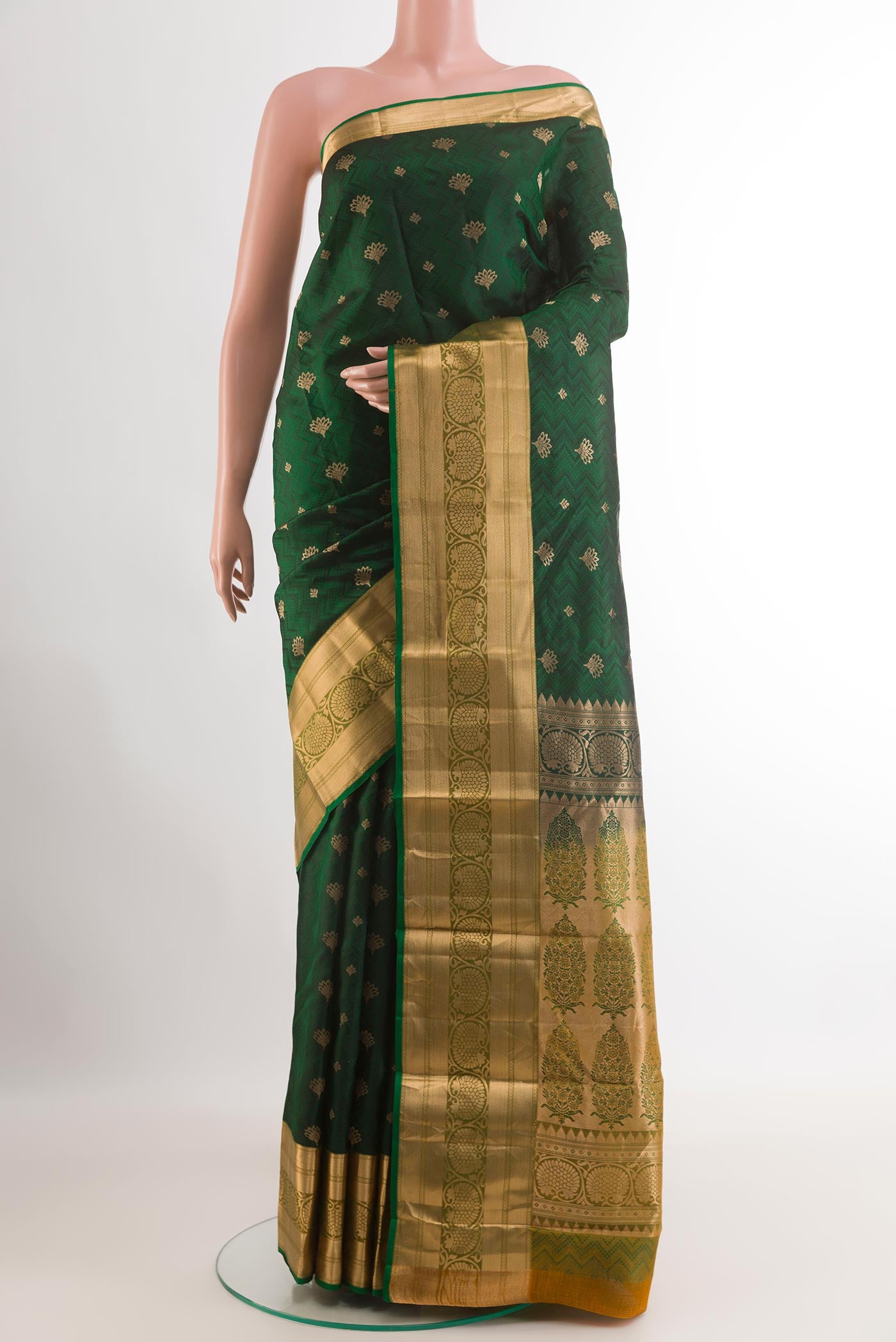 Green Kanjivaram Silk Saree with Jacquard With Zari Butta on the body and Zari Border.  displayed on a mannequin