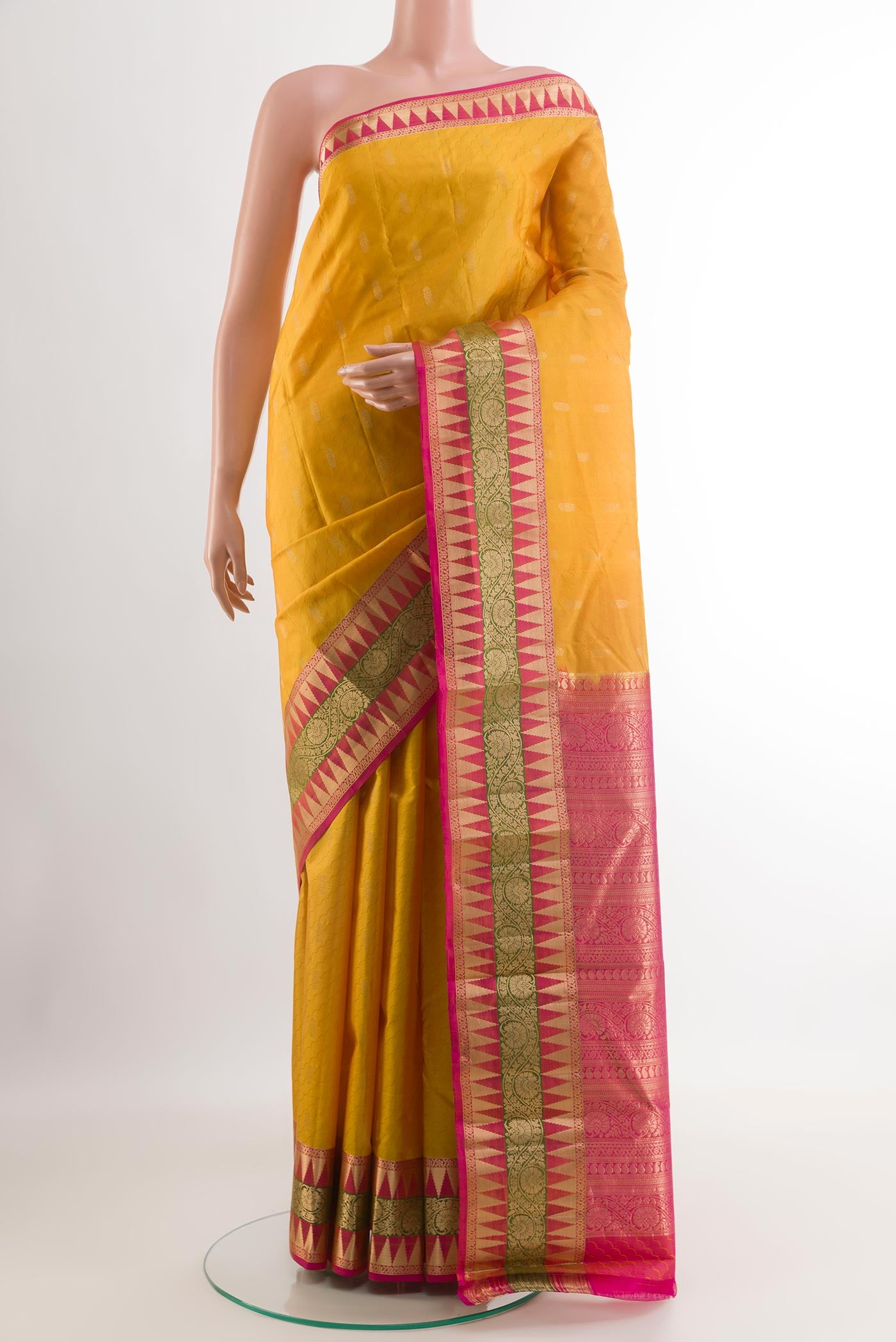 Yellow Kanjivaram Silk Saree with Jacquard With Zari Butta on the body and Zari Border.  displayed on a mannequin