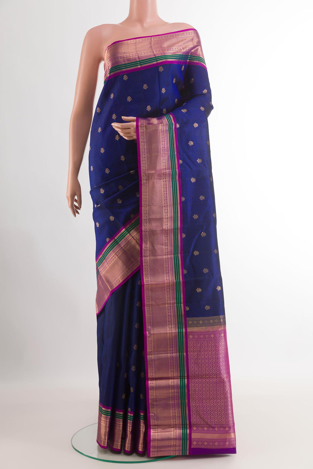 Dark Blue Kanjivaram Silk Saree with Jacquard With Zari Butta on the body and Zari Border.  displayed on a mannequin