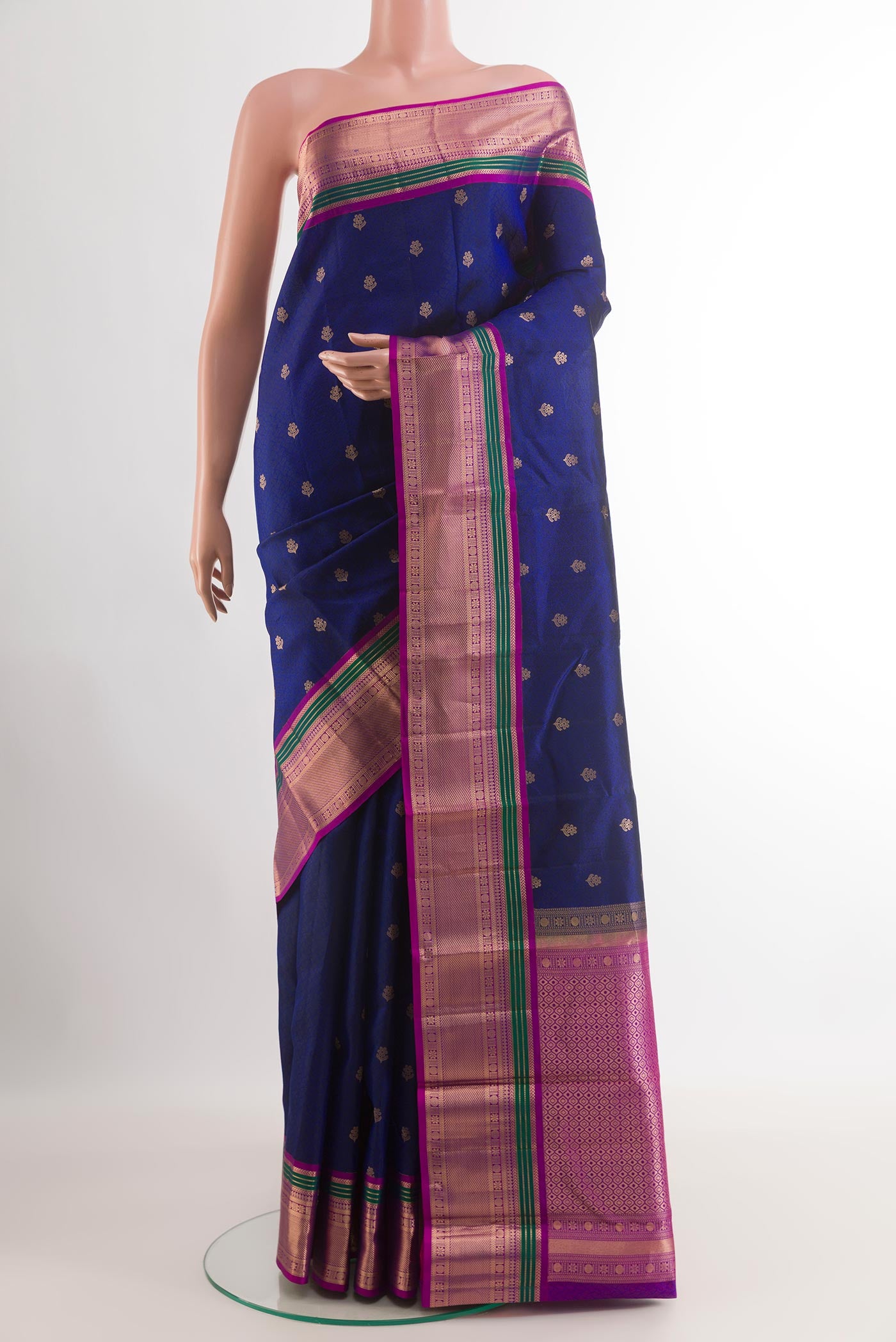Dark Blue Kanjivaram Silk Saree with Jacquard With Zari Butta on the body and Zari Border.  displayed on a mannequin