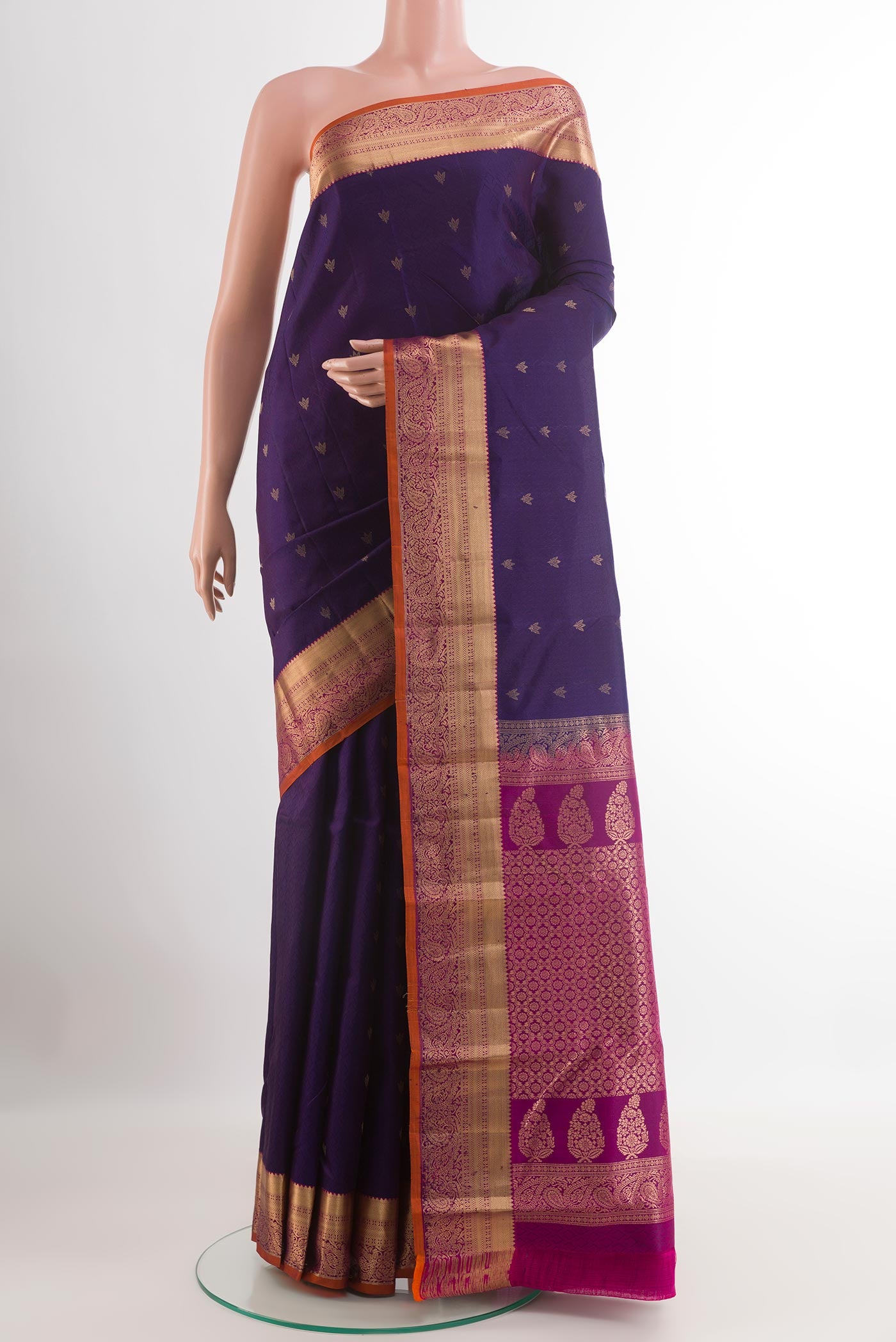 Dark Blue Kanjivaram Silk Saree with Jacquard With Zari Butta on the body and Zari Border.  displayed on a mannequin