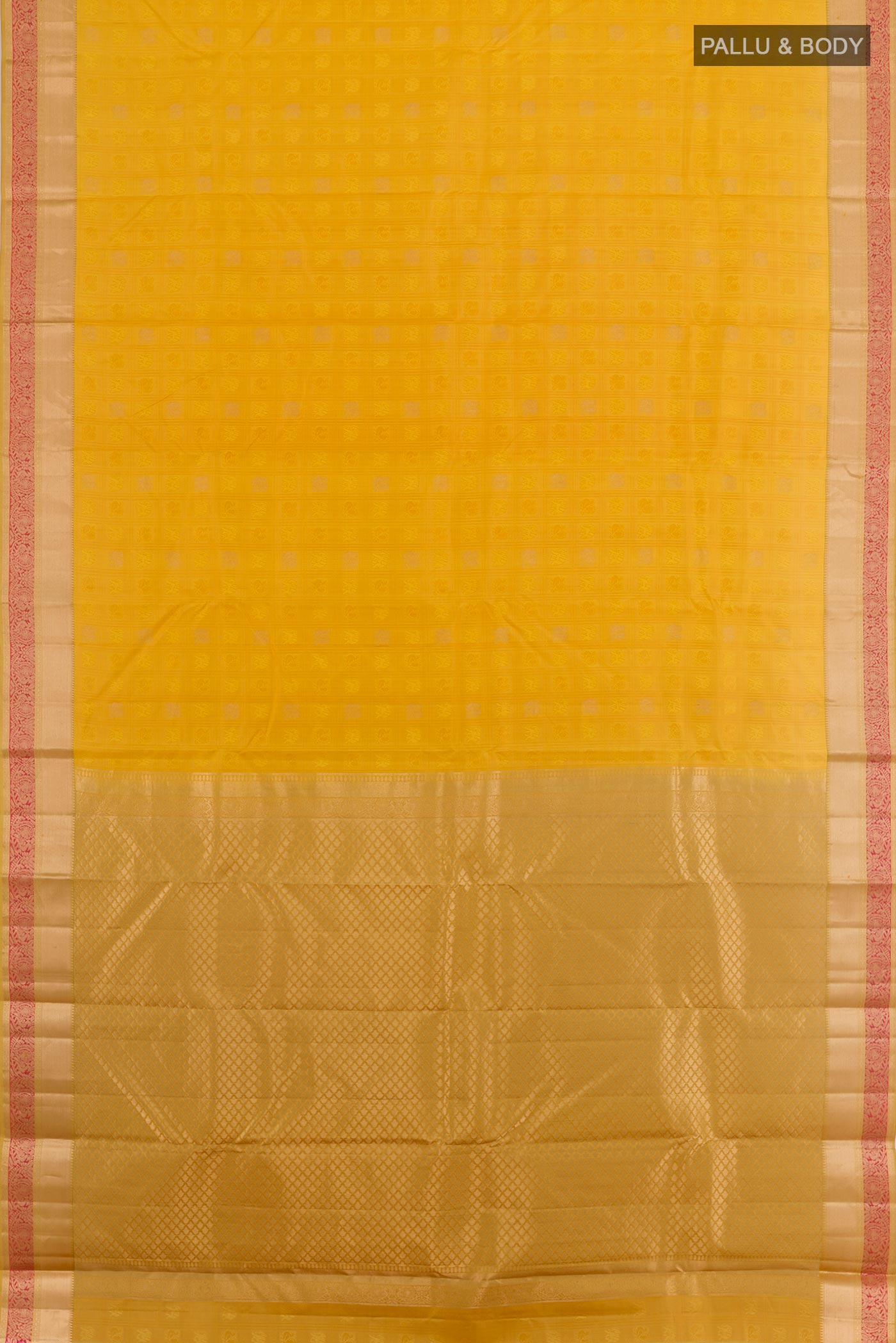Flat view of Yellow Kanjivaram Silk Saree with Jacquard design on the body and Zari Border. 