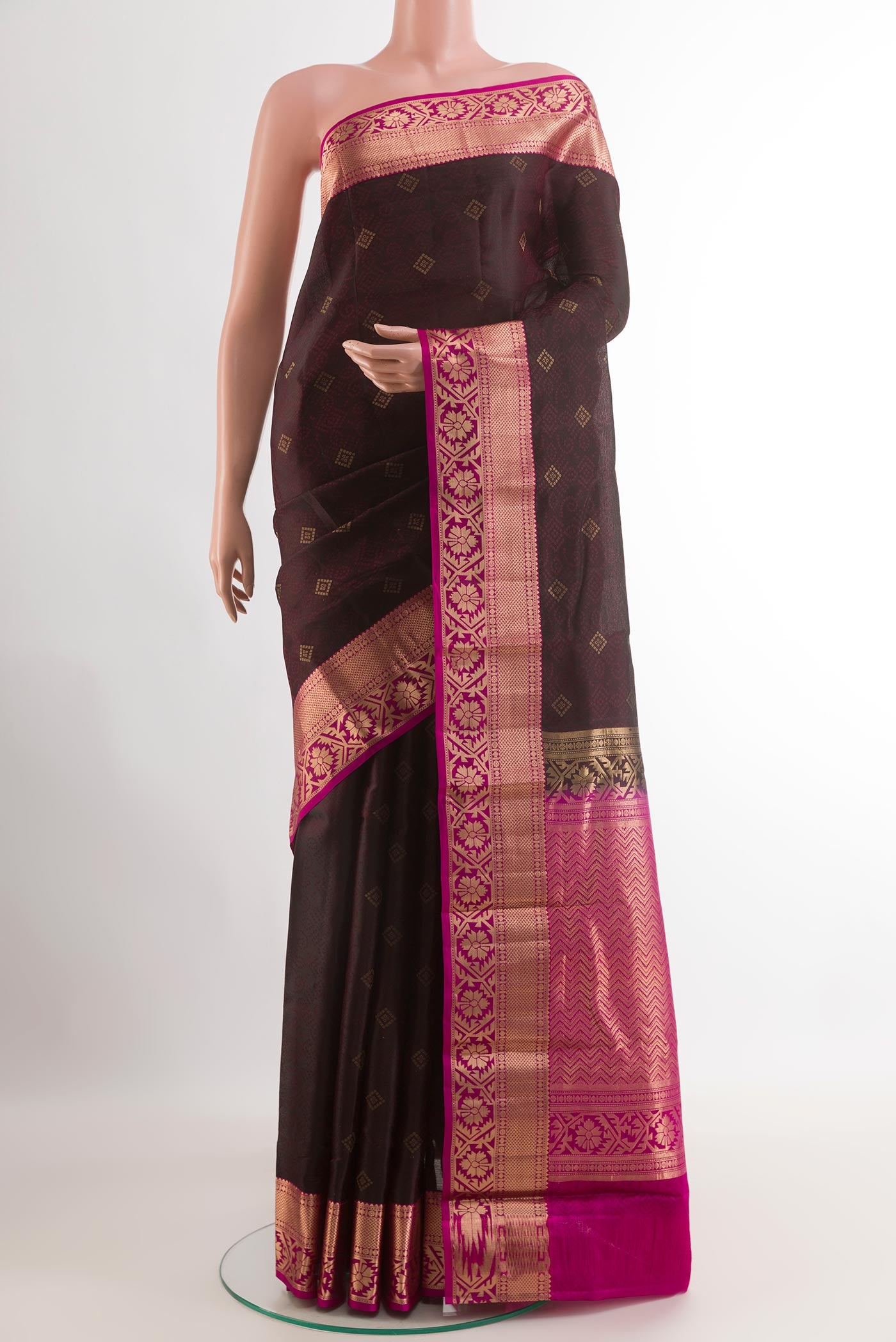 Black Kanjivaram Silk Saree with Jacquard With Zari Butta on the body and Zari Border.  displayed on a mannequin