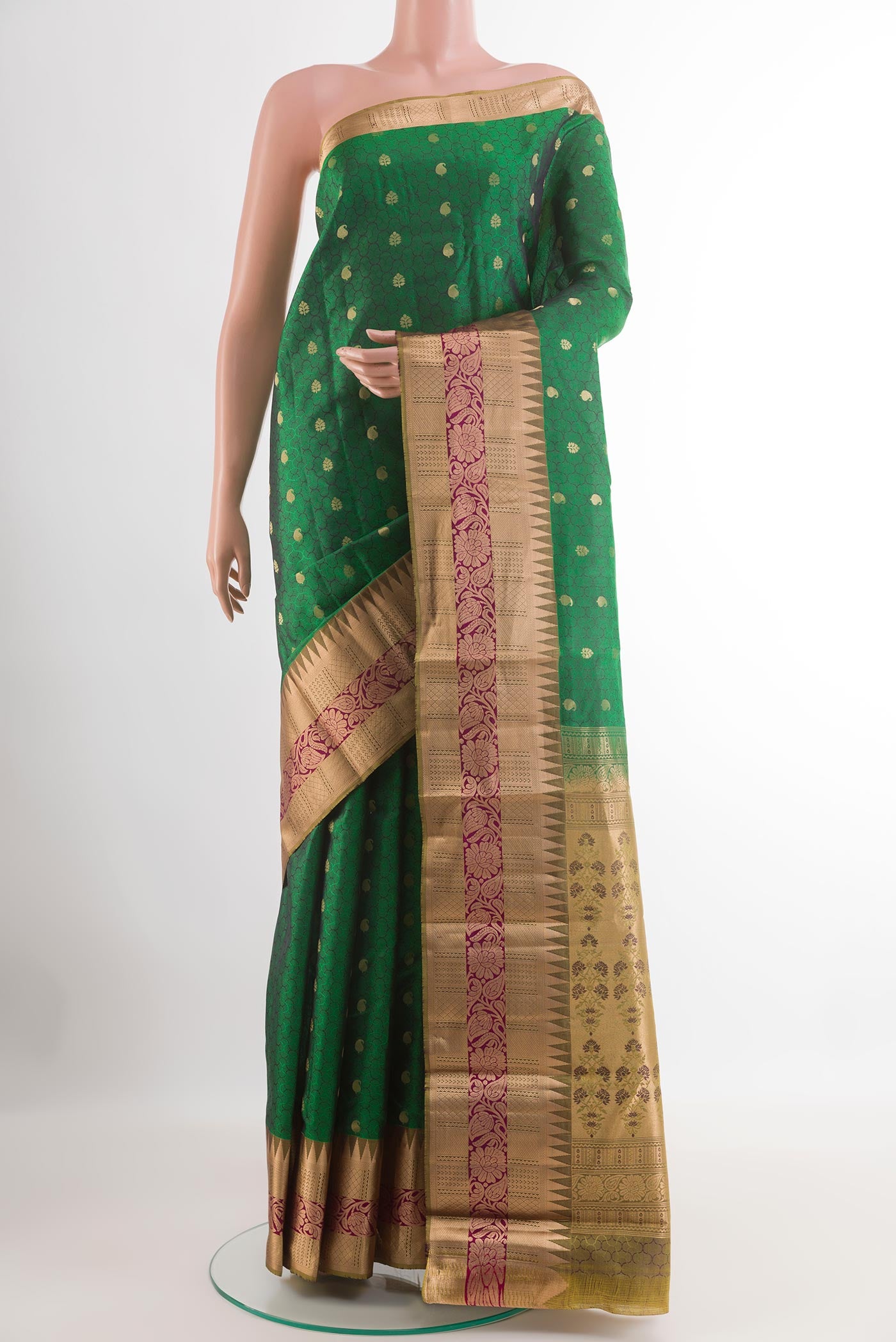 Green Kanjivaram Silk Saree with Jacquard With Zari Butta on the body and Zari Border.  displayed on a mannequin