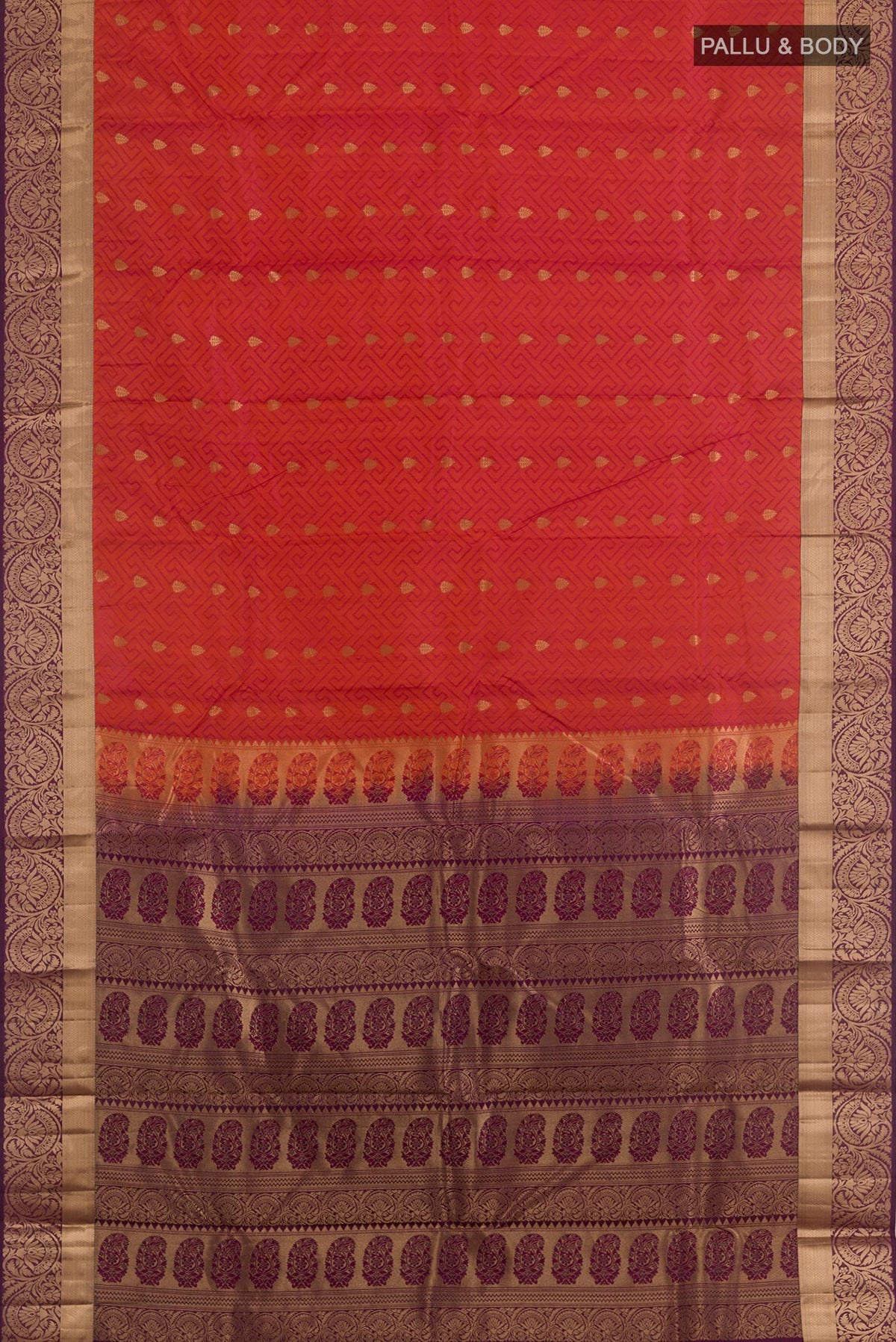 Flat view of Rust Kanjivaram Silk Saree with Jacquard With Zari Butta on the body and Zari Border. 