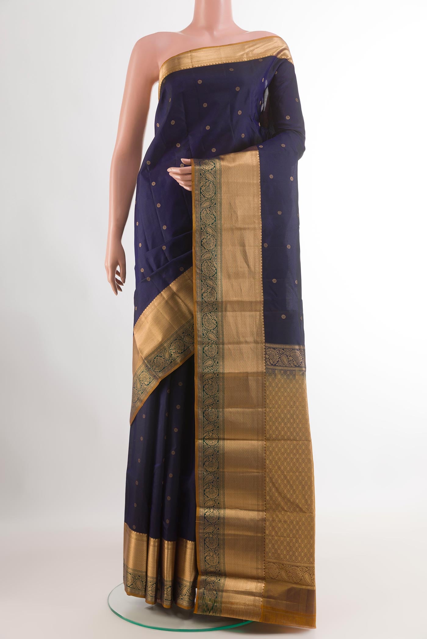 Blue Kanjivaram Silk Saree with Zari Butta on the body and Zari Border.  displayed on a mannequin