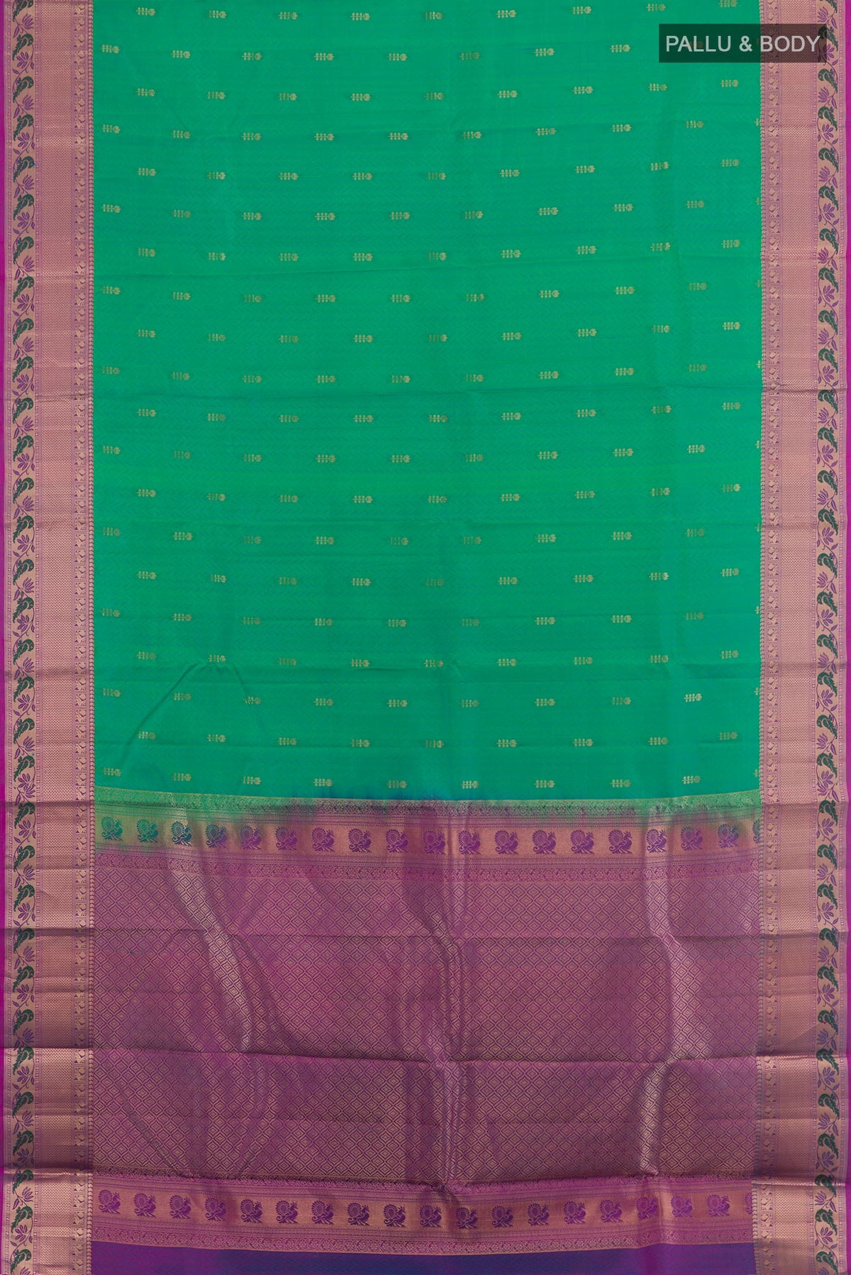 Flat view of Green Kanjivaram Silk Saree with Jacquard With Zari Butta on the body and Zari Border. 