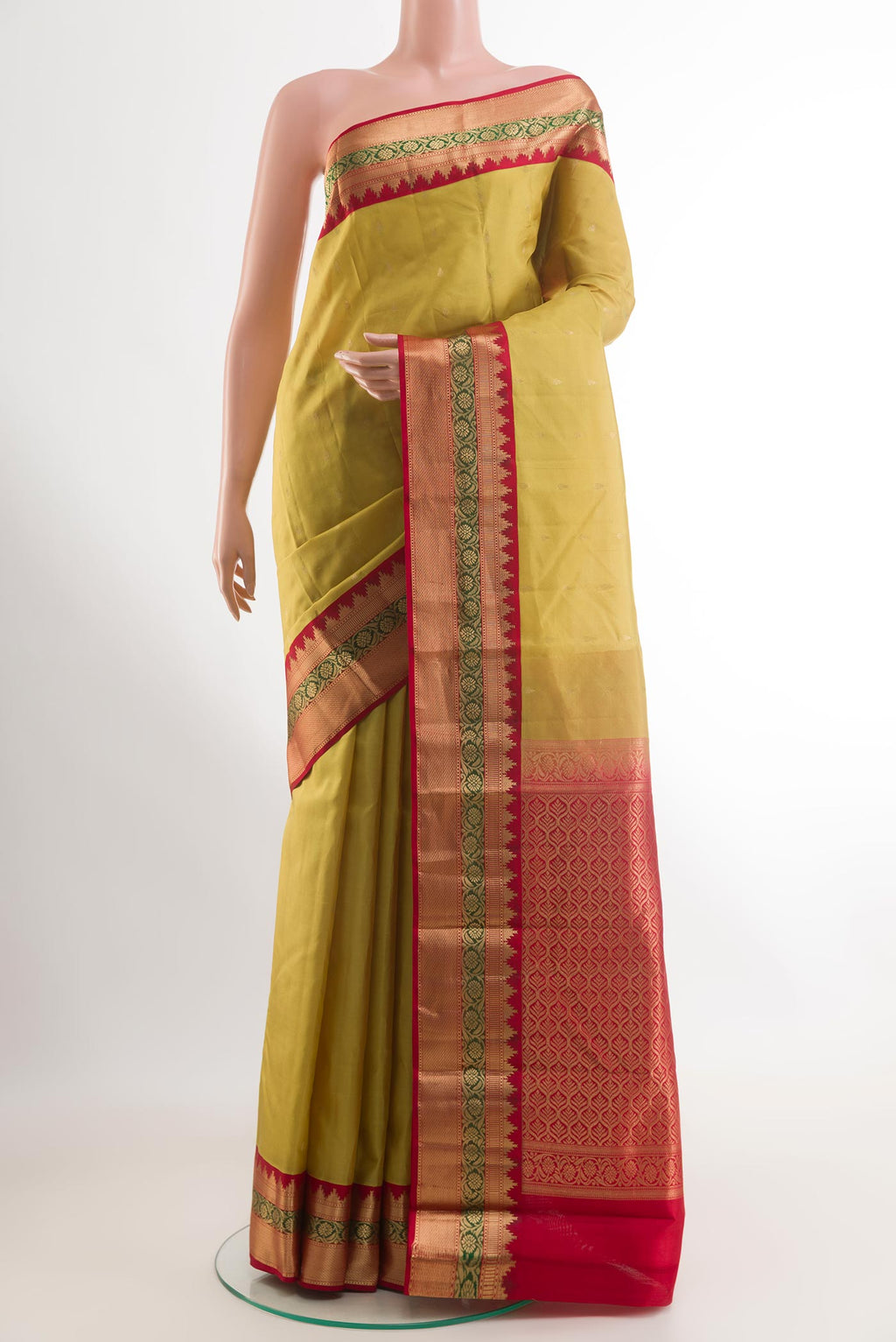Lemon Yellow Kanchipuram Silk Saree with Zari Butta on the body and Zari Border.  displayed on a mannequin
