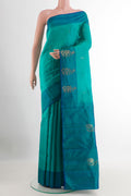 Blue Kanchipuram Silk Saree with Zari Butta on the body and Zari Border.  displayed on a mannequin