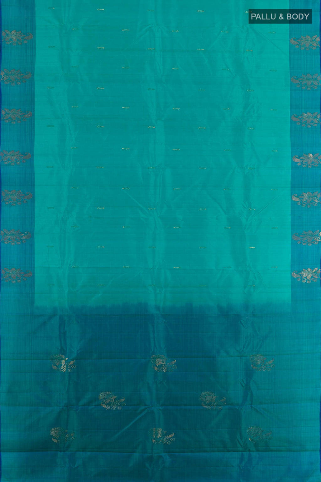 Flat view of Blue Kanchipuram Silk Saree with Zari Butta on the body and Zari Border. 