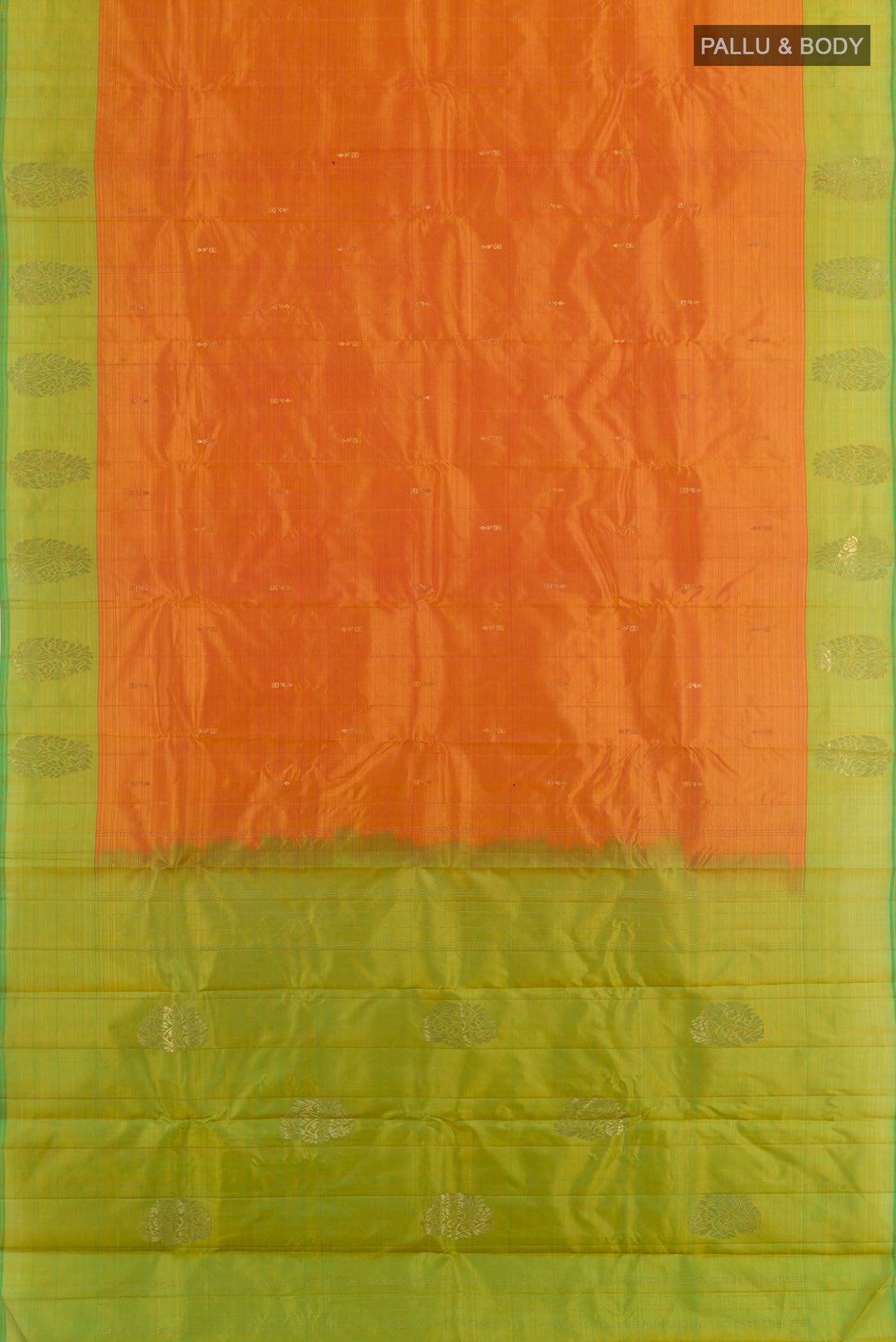 Flat view of Orange Kanchipuram Silk Saree with Zari Butta on the body and Zari Border. 