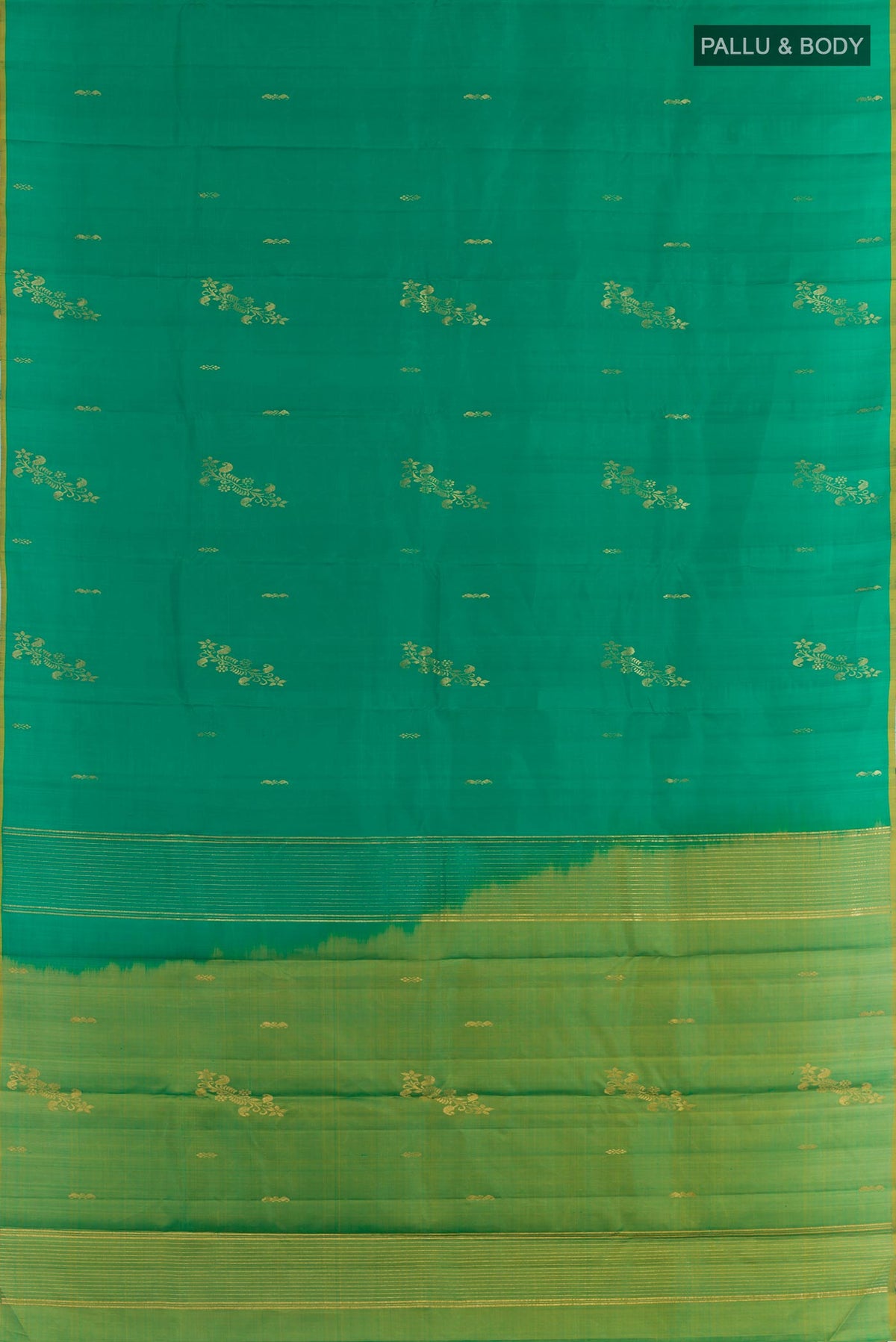 Flat view of Green Kanchipuram Silk Saree with Zari Butta on the body and Zari Border. 