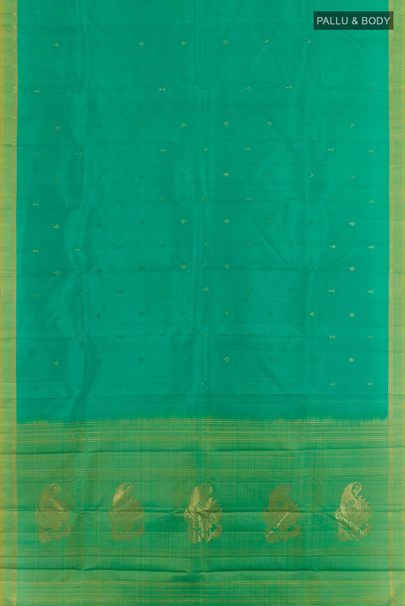 Flat view of Green Kanchipuram Silk Saree with Zari Butta on the body and Zari Border. 