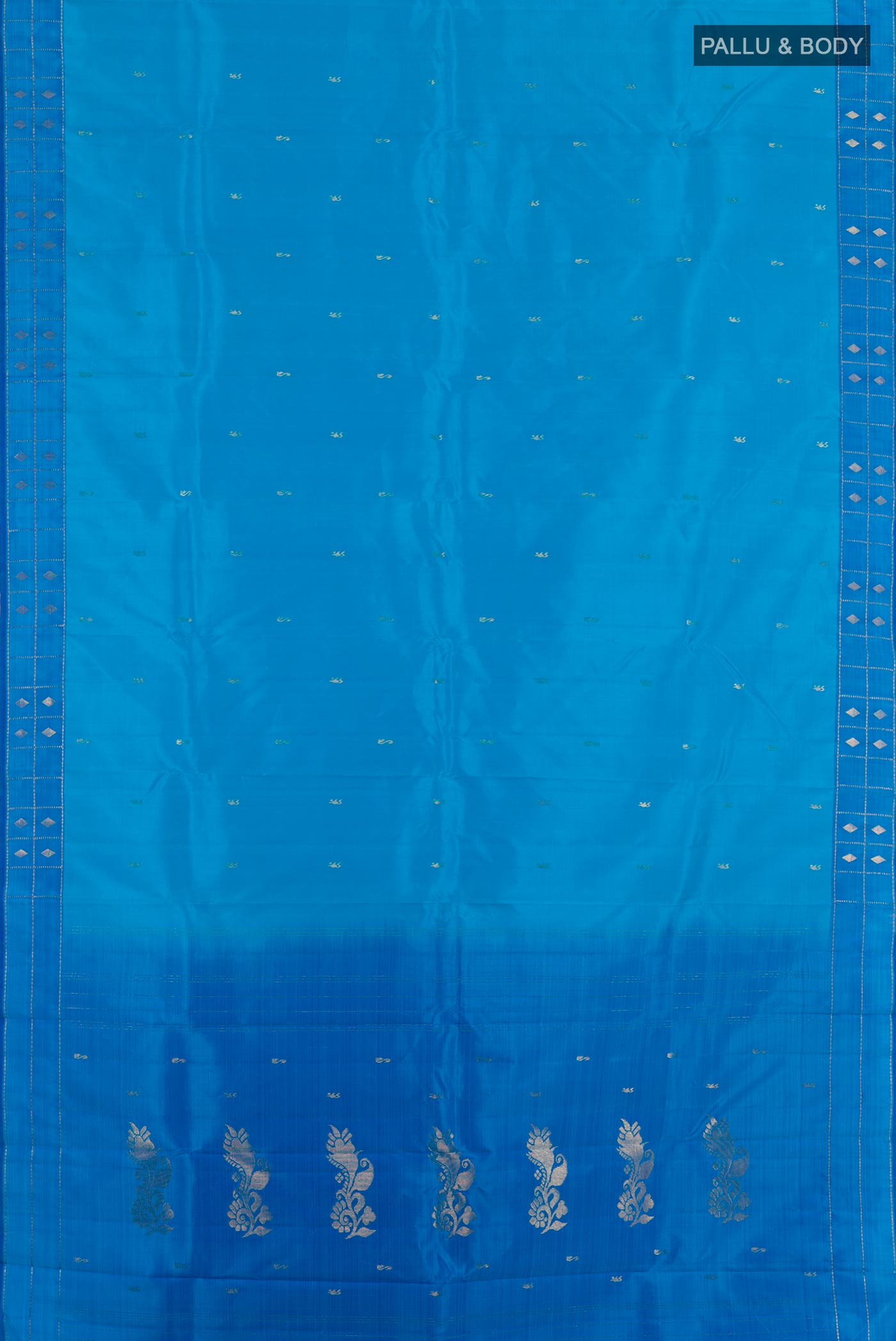 Flat view of Blue Kanchipuram Silk Saree with Zari Butta on the body and Zari Border. 