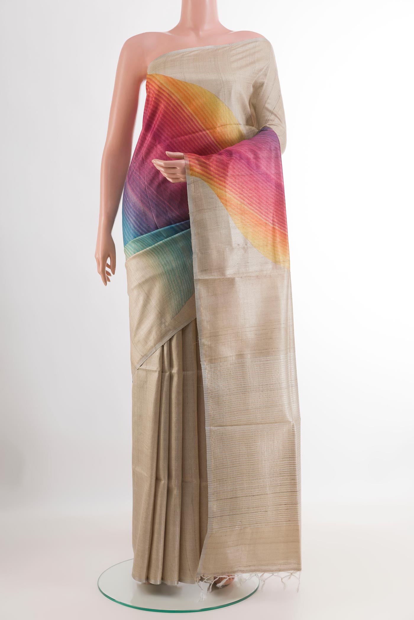 Beige Tussar Saree with Plain Body and Zari Border.  displayed on a mannequin