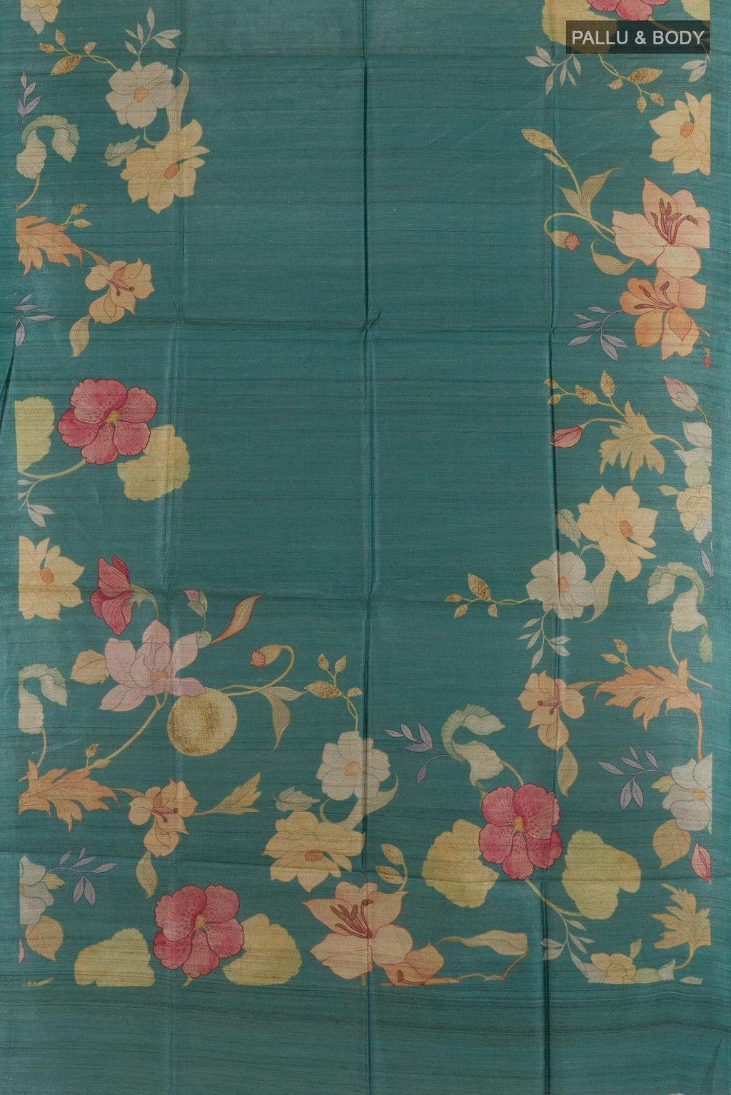 Flat view of Sea Green Tussar Saree with Printed design on the body and Without Border. 