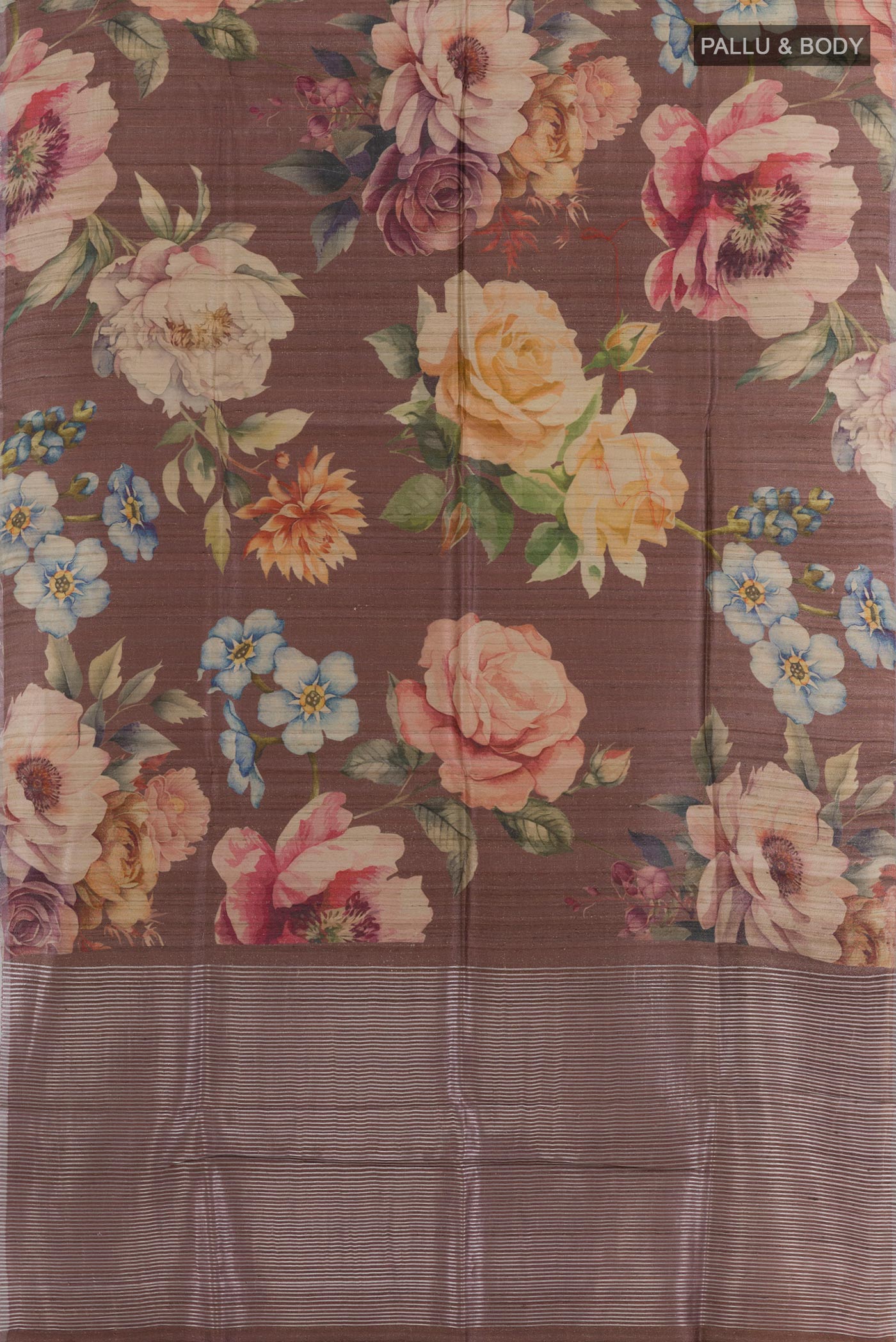 Flat view of Lavender Tussar Saree with Printed design on the body and Zari Border. 