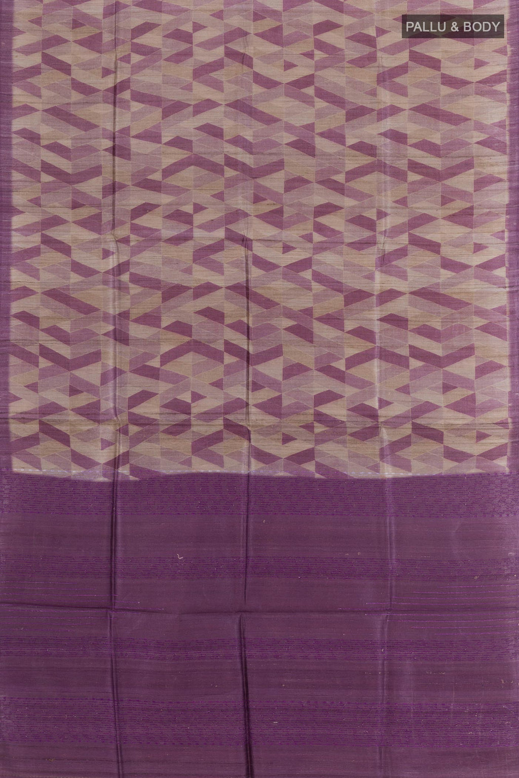 Flat view of Purple Tussar Saree with Printed design on the body and Zari Border. 