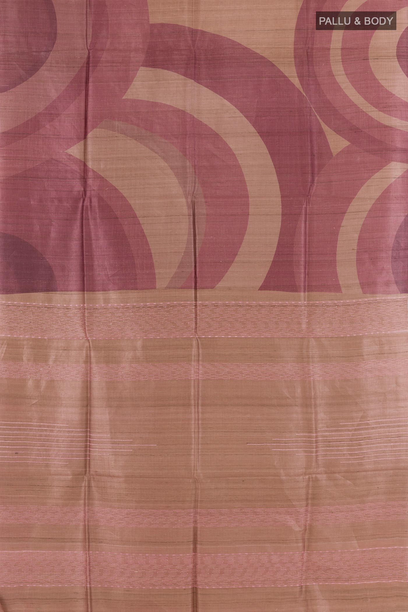 Flat view of Magenta Tussar Saree with Printed design on the body and Zari Border. 