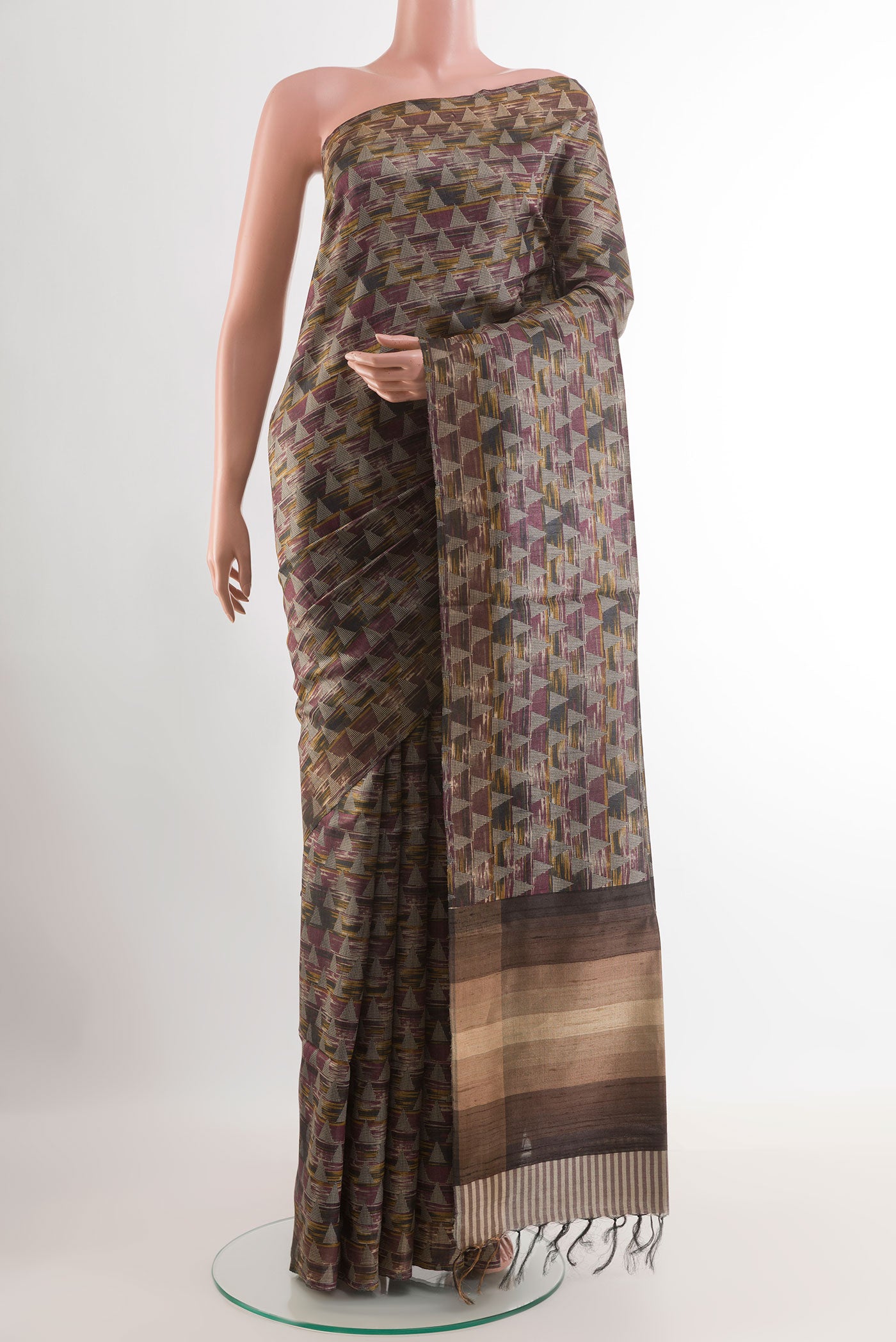 Multi Color Tussar Saree with Printed design on the body and Zari Border.  displayed on a mannequin