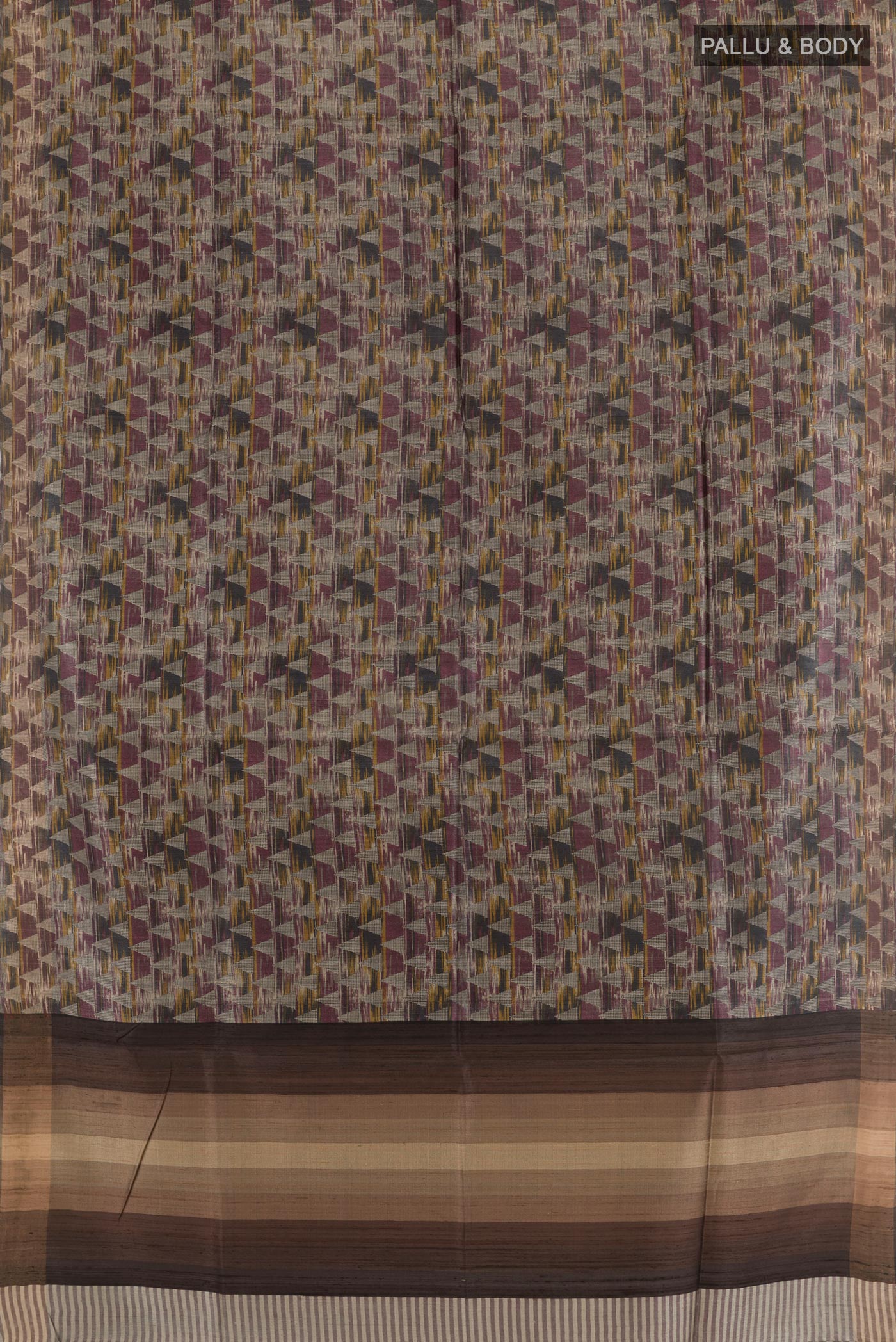 Flat view of Multi Color Tussar Saree with Printed design on the body and Zari Border. 